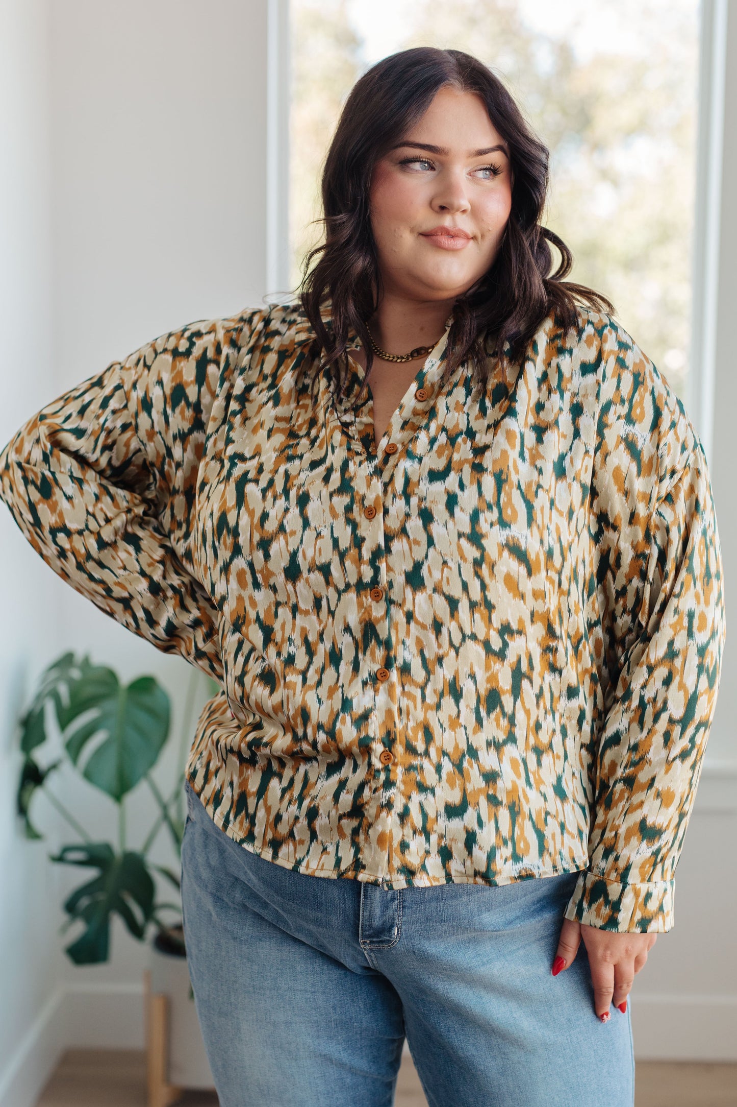 Plus size model in Kathryn Satin Button Up Blouse, button front with abstract gold satin design
