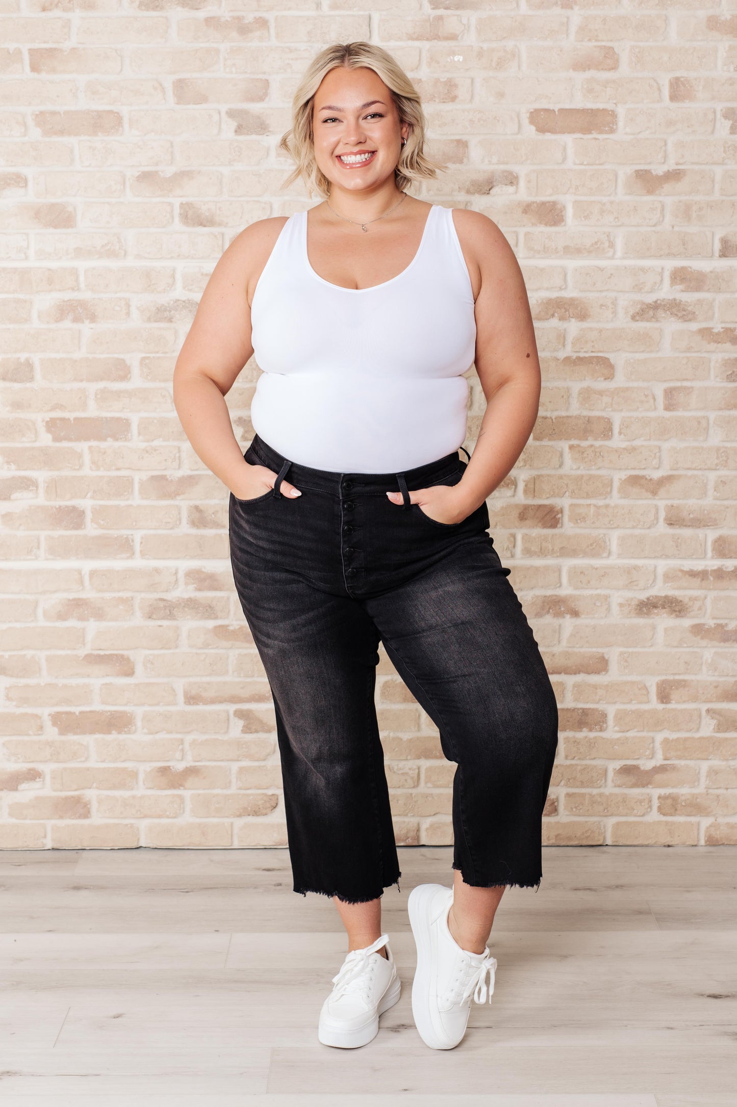 Plus size full body of Ryan Wide Leg Crop Jeans with cropped length and wide-leg silhouette.