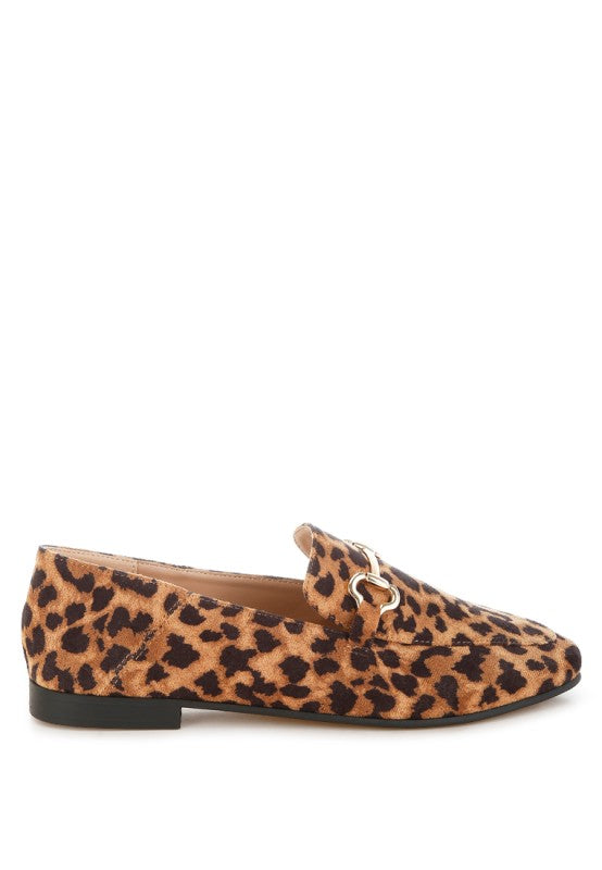 Side view of leopard print flat loafers with cushioned insole and round toe.