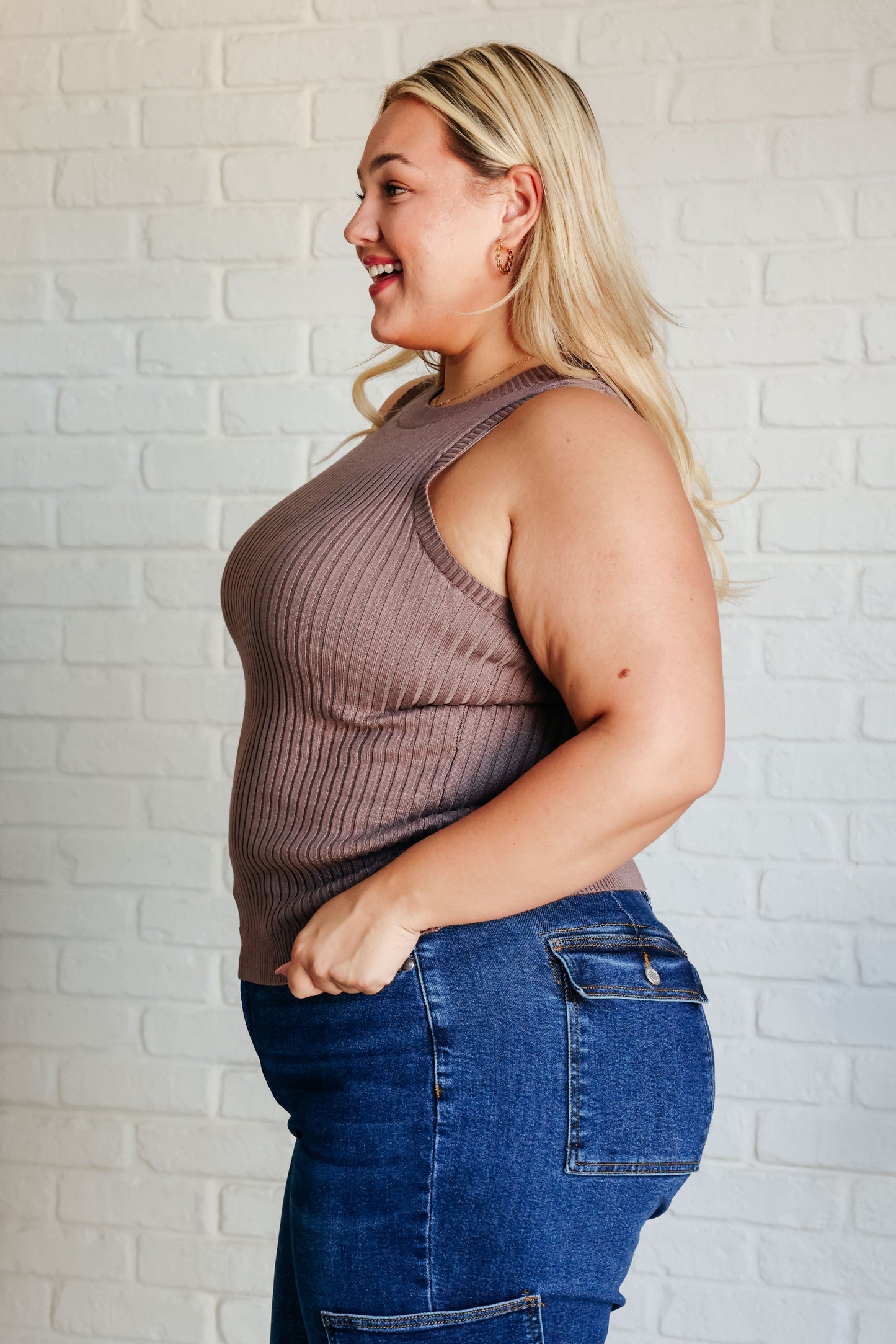 Plus size side view of Lenny Ribbed Sweater Tank in brown ribbed knit fabric with round neckline and fitted silhouette.