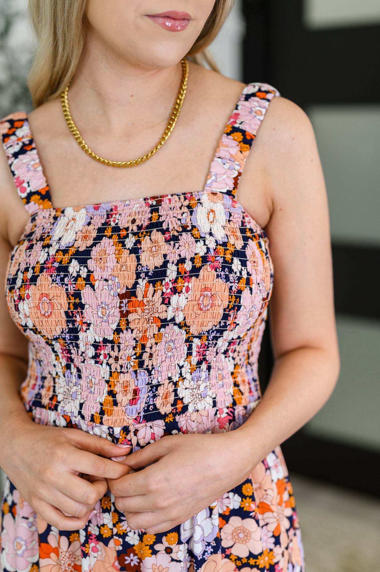 Livvy sleeveless floral jumpsuit with wide leg and functional pockets - close up view.