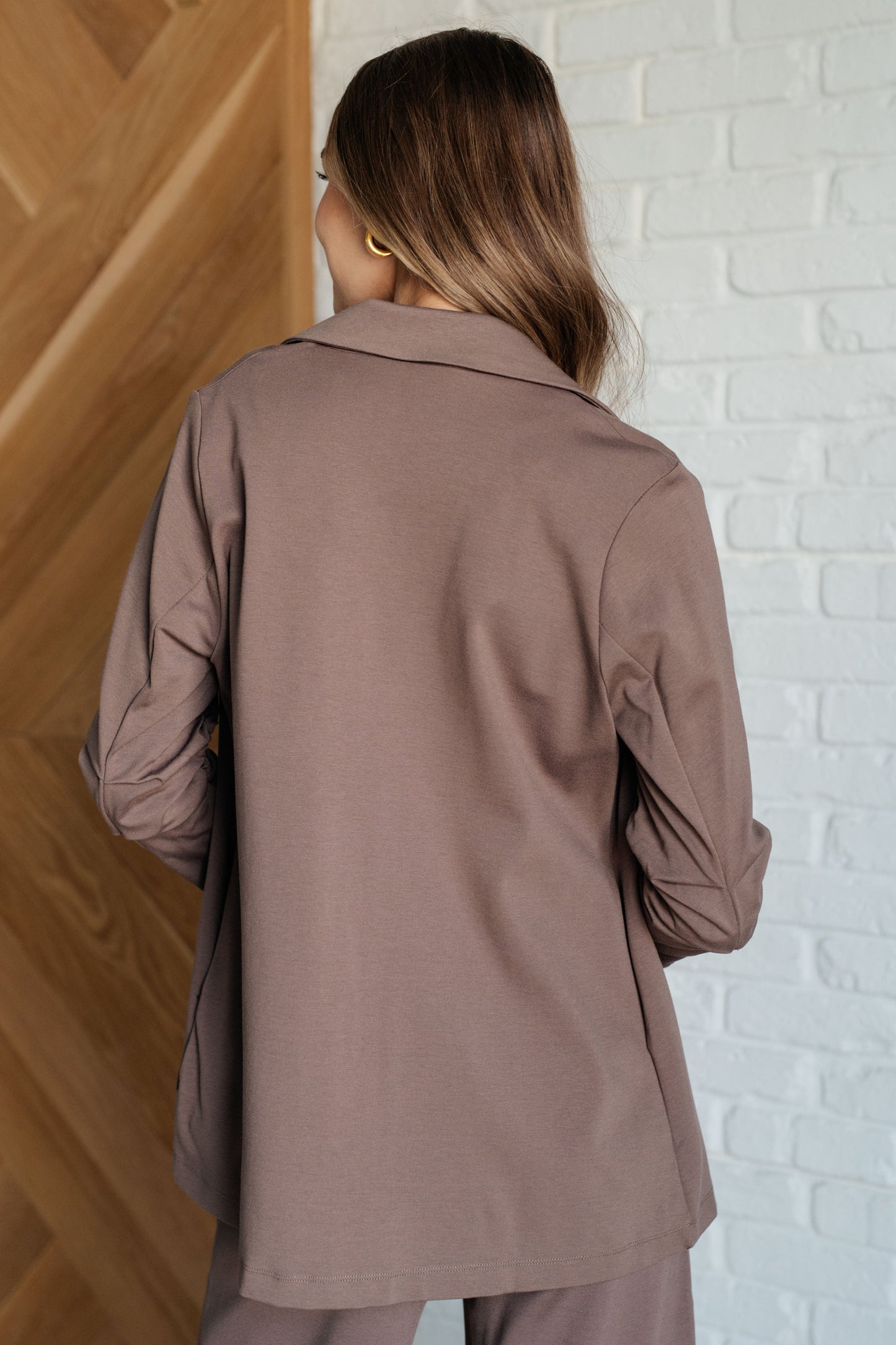 Back view of Devi Magic Blazer in dark mocha, sleek slim fit.