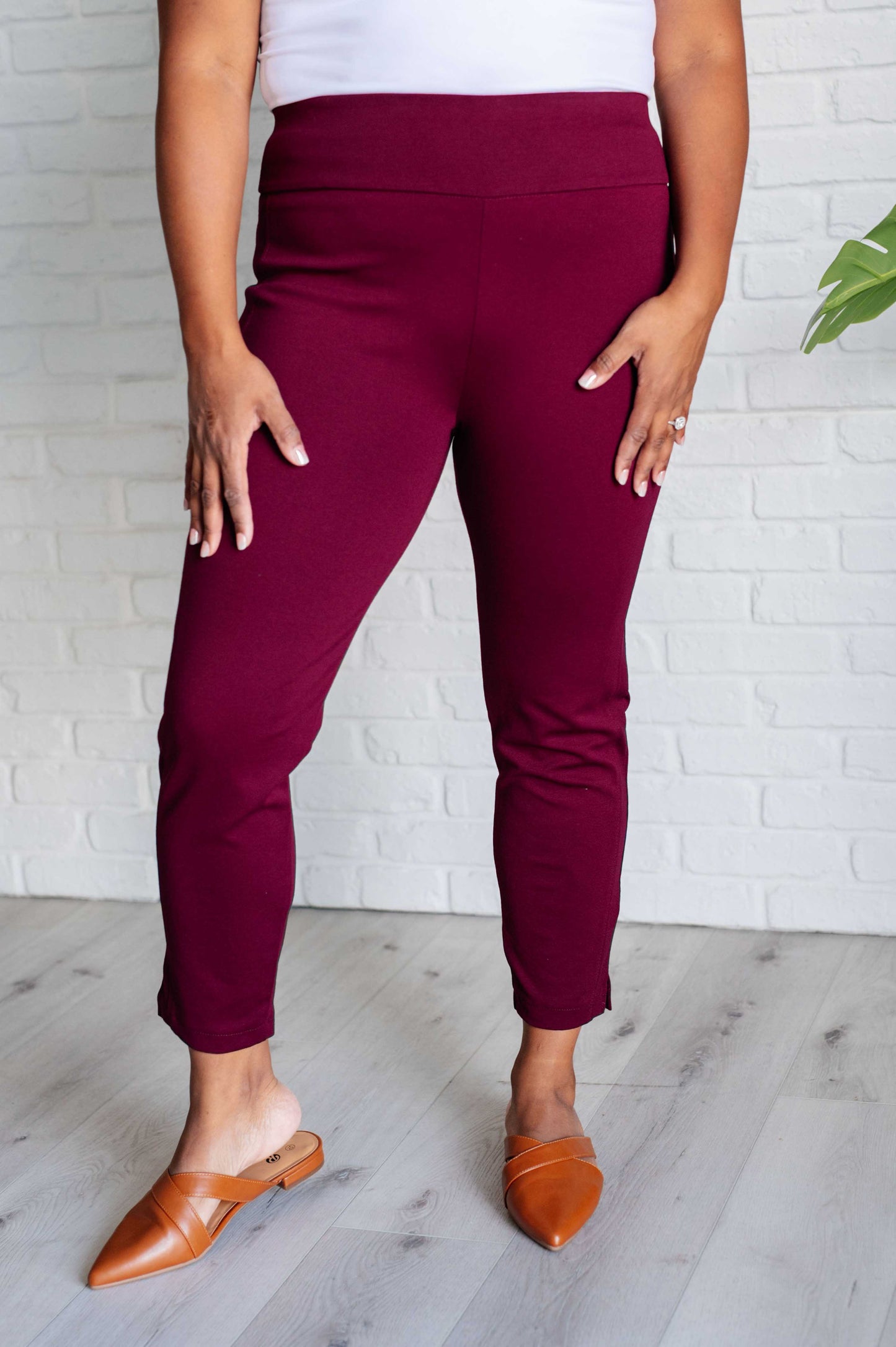 Plus size front view of Midge Magic Skinny Pants in wine with high-rise slim fit and polished tuxedo stripe details.