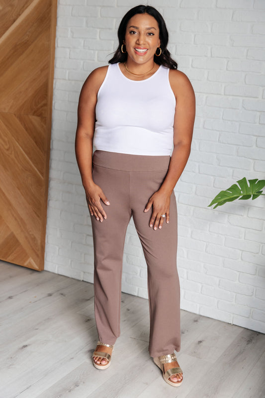Plus size model in Rosita Dark Mocha Magic Straight Pants showing slim fit and flattering waistband.