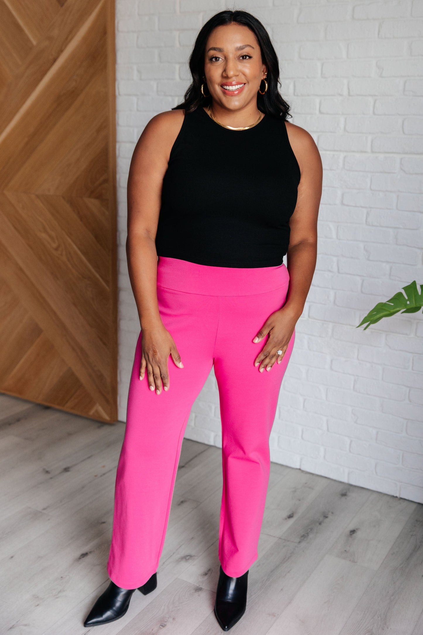 Plus size full body of Rosita Hot Pink Magic Straight Pants with slim straight-leg silhouette.