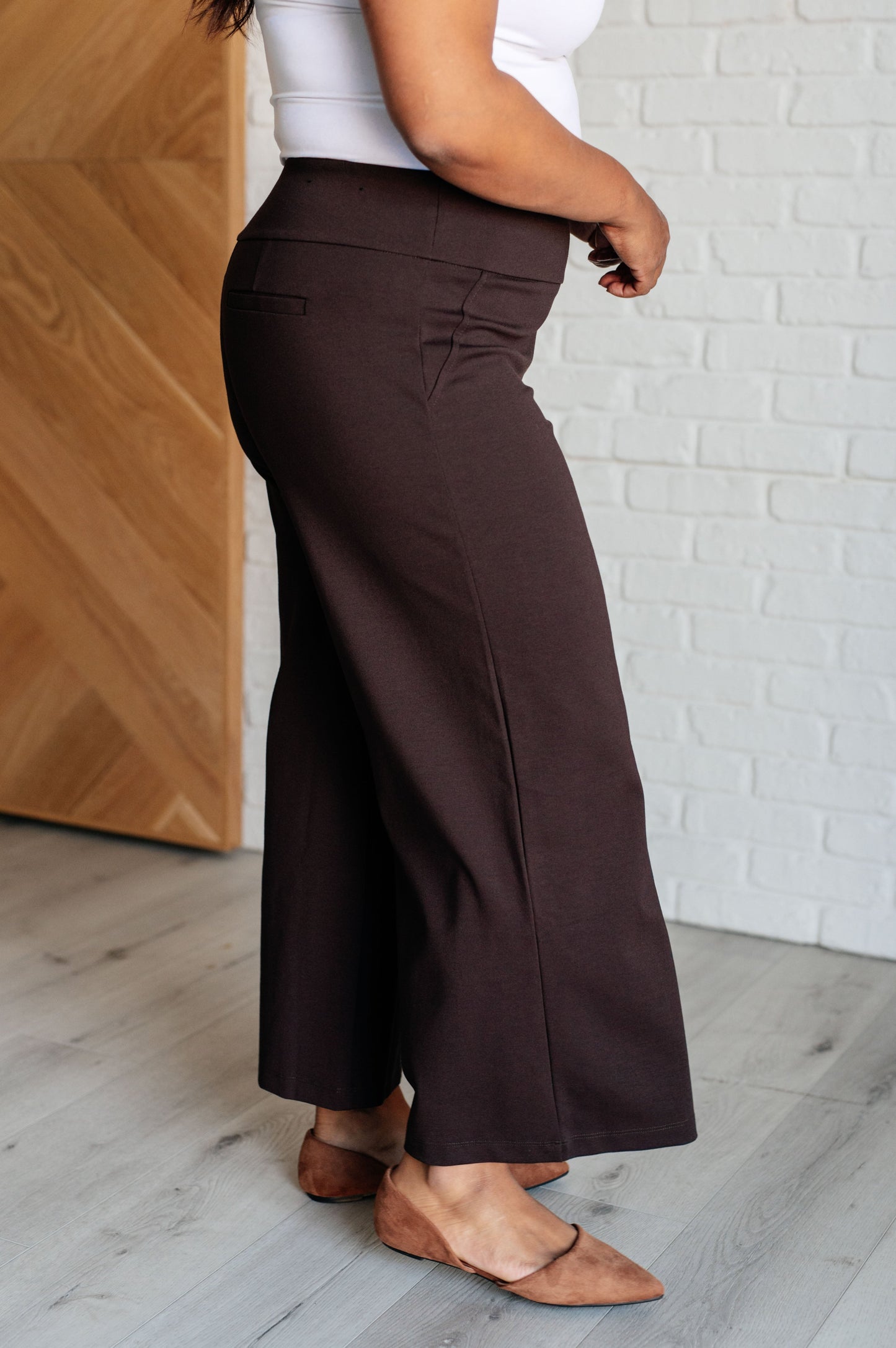 Plus size chocolate ponte knit wide leg crop pants, cropped cut, high-rise fit, faux welt pocket detail.