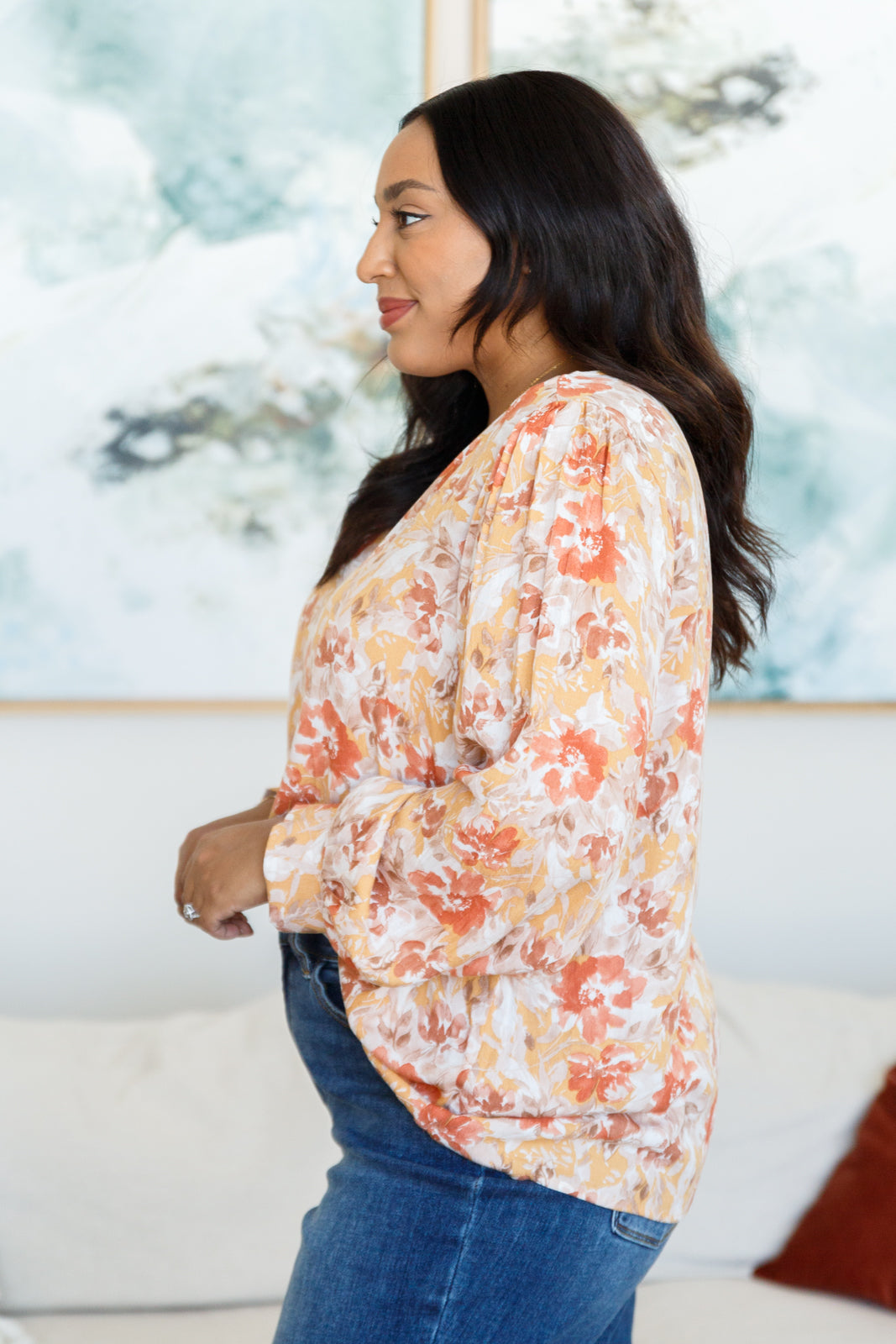 Plus size side view of Marigold Floral Blouse in warm fall floral print