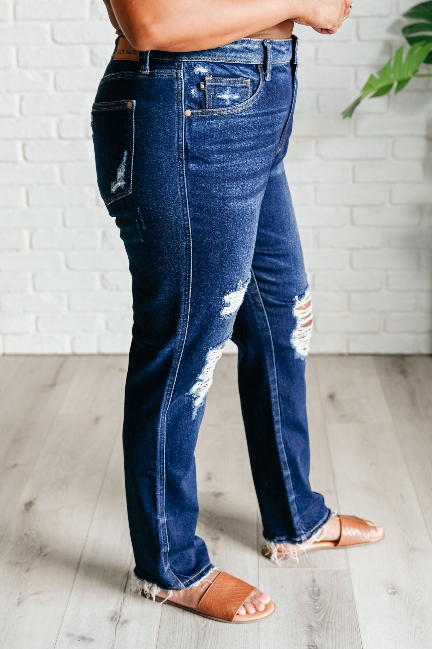 Plus size side view of Montana High Rise Distressed Judy Blue Jeans.