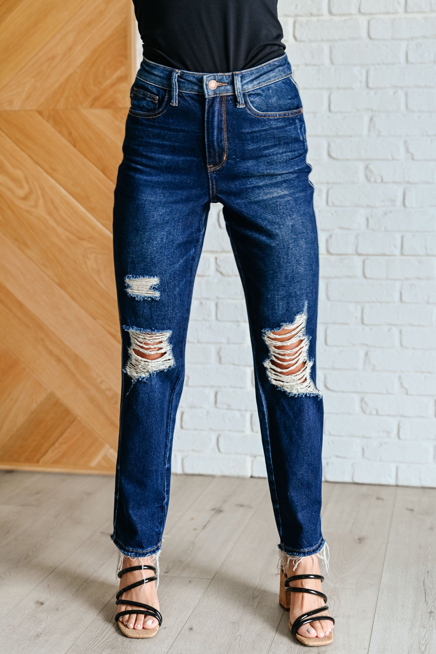 Front view of Montana High Rise Distressed Jeans in dark wash with straight leg.