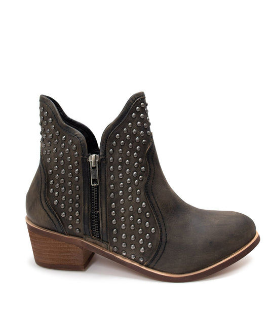 Side view of Nellie Studded Ankle Boots, showing studded detailing, round toe, and side zipper.