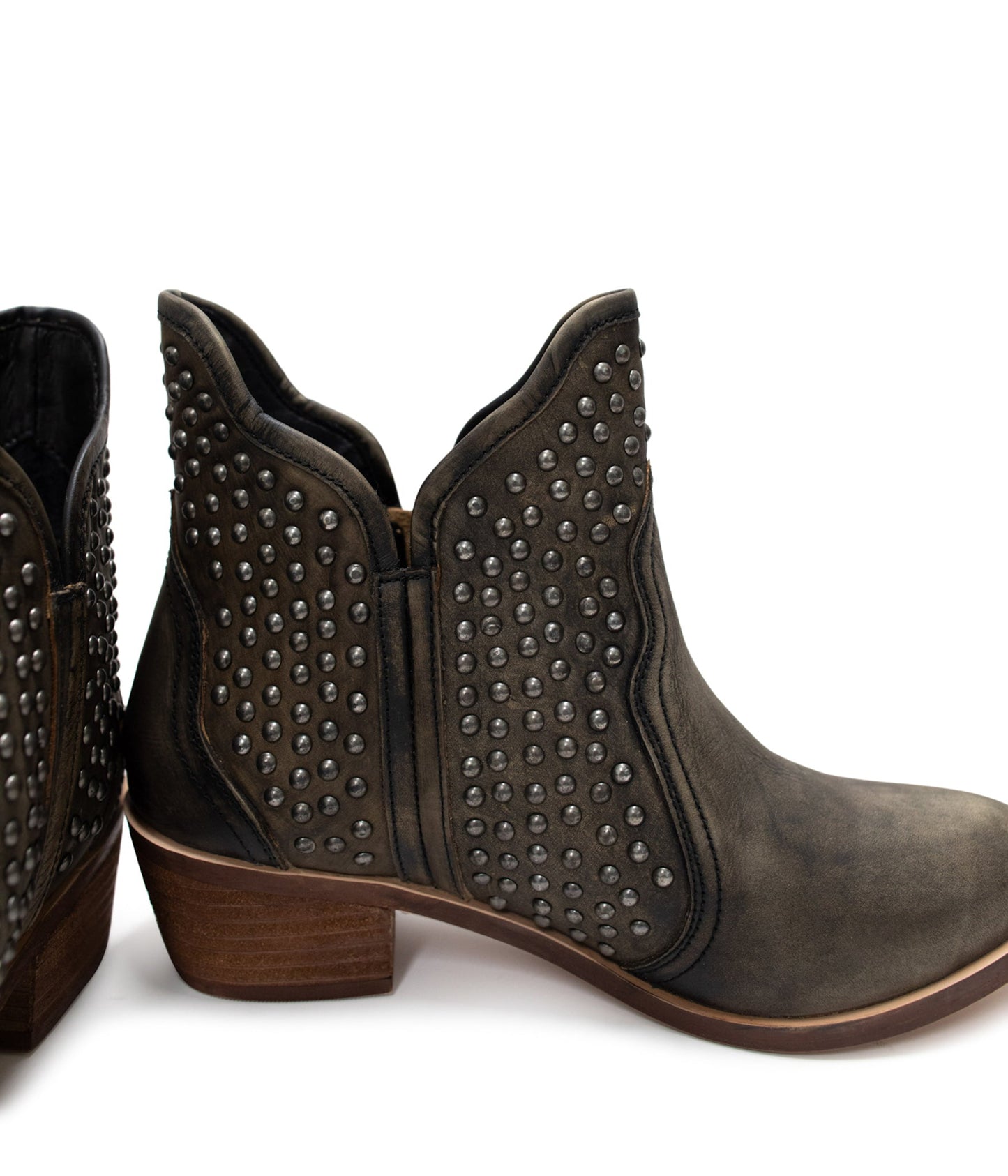 Side angle of Nellie Studded Ankle Boots, showing sleek leather finish and low heel.