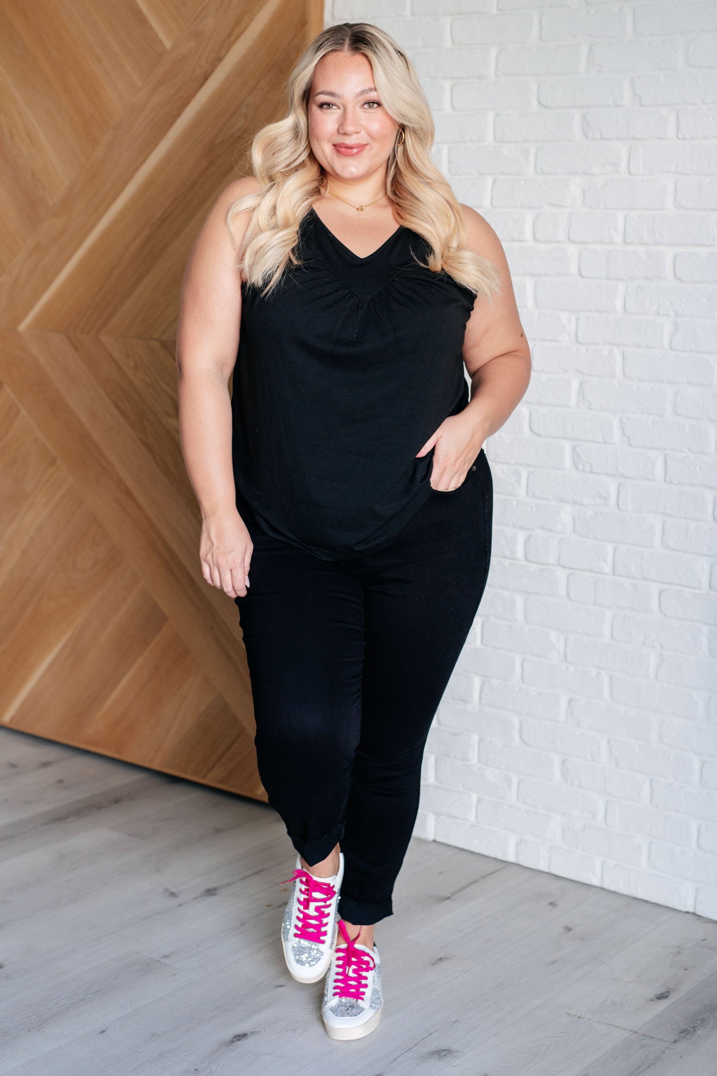 Plus size full body view of Nala V-Neck Tank Top in black, styled for versatile wear.
