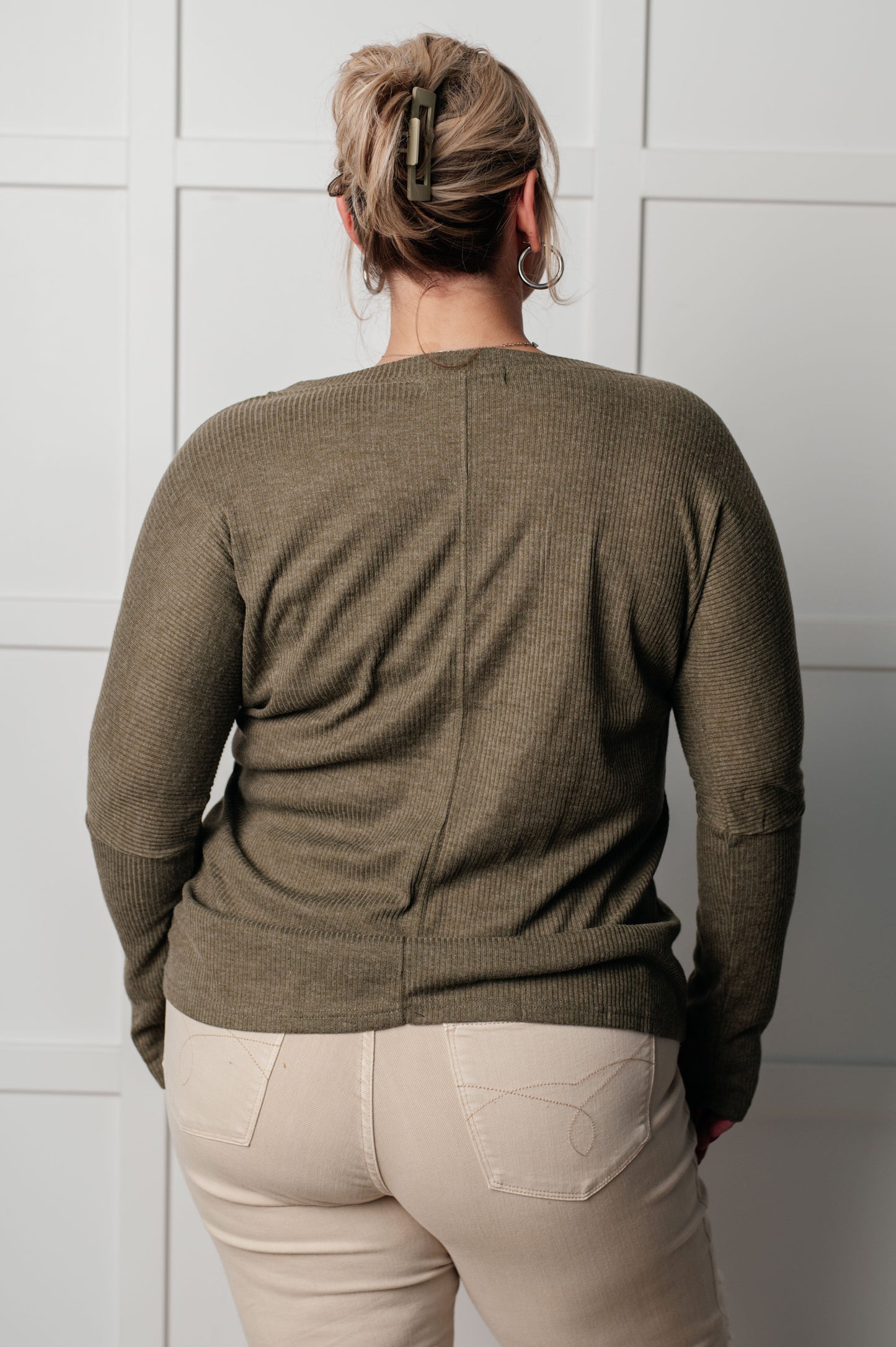 Plus back view Joplin Ribbed Knit V-Neck Top in khaki paired with casual pants