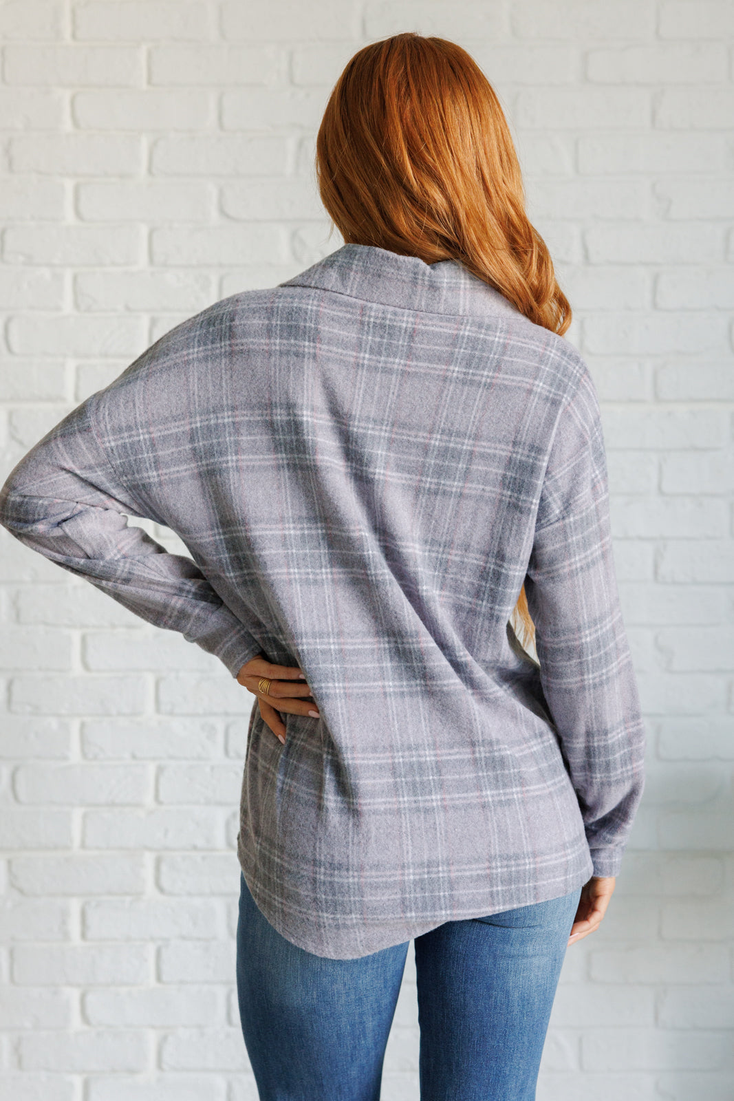 Back view of Harvey Plaid Button Up in light gray plaid with relaxed silhouette.