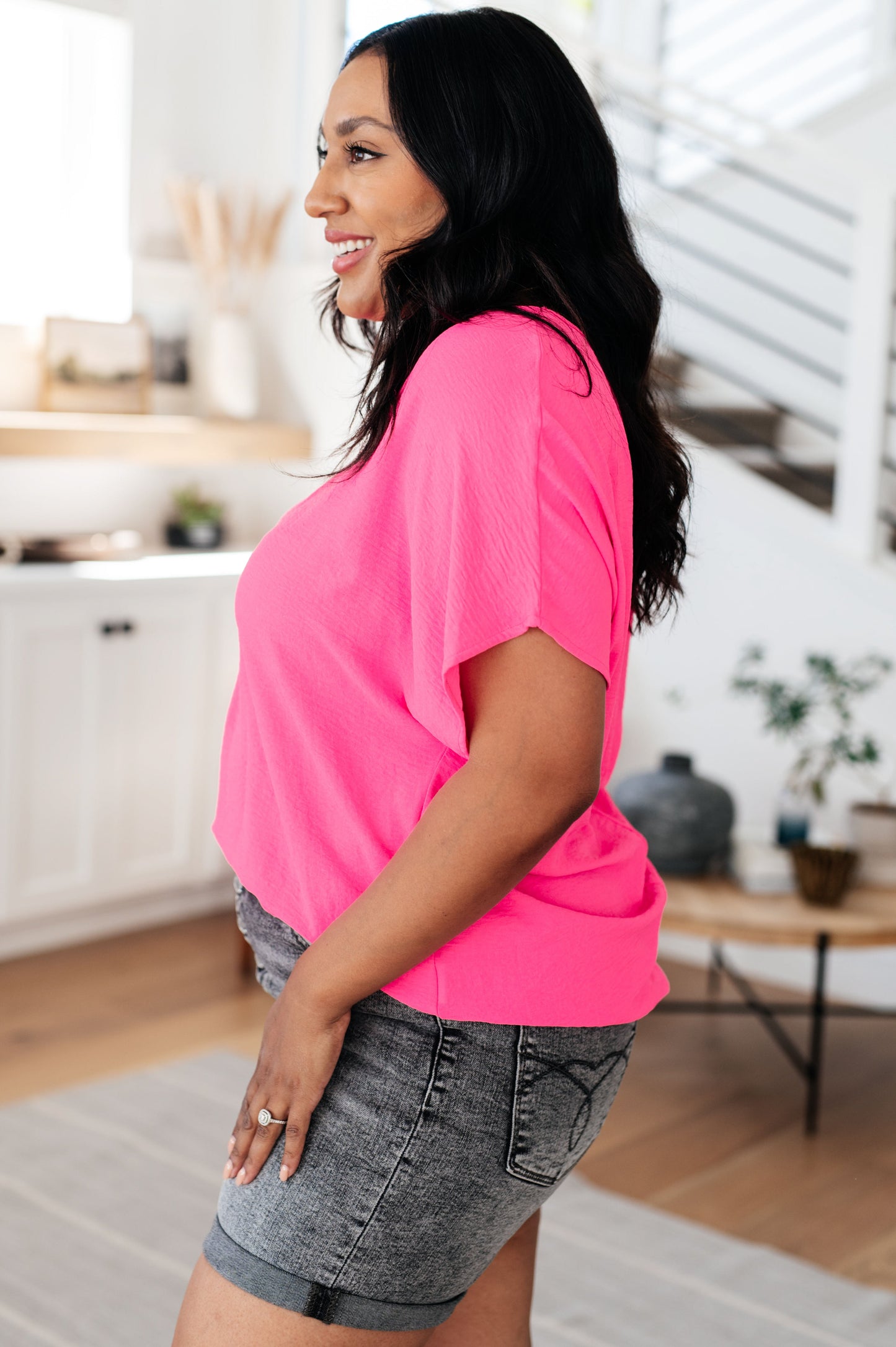 Plus size side view of Palmer Pink V Neck Blouse with breezy dolman sleeves and lightweight design.