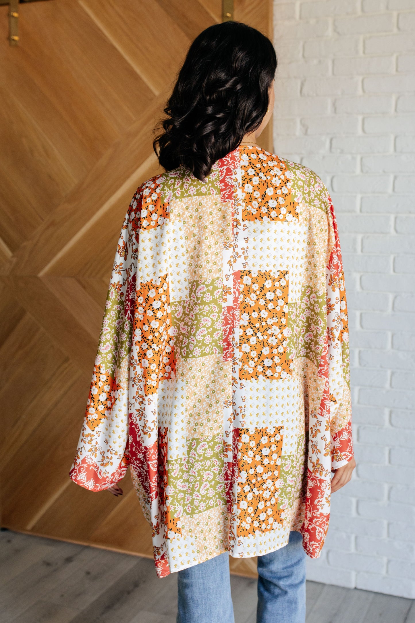 Back view of Patch Mixed Floral Kimono showcasing orange floral mix and relaxed drape.