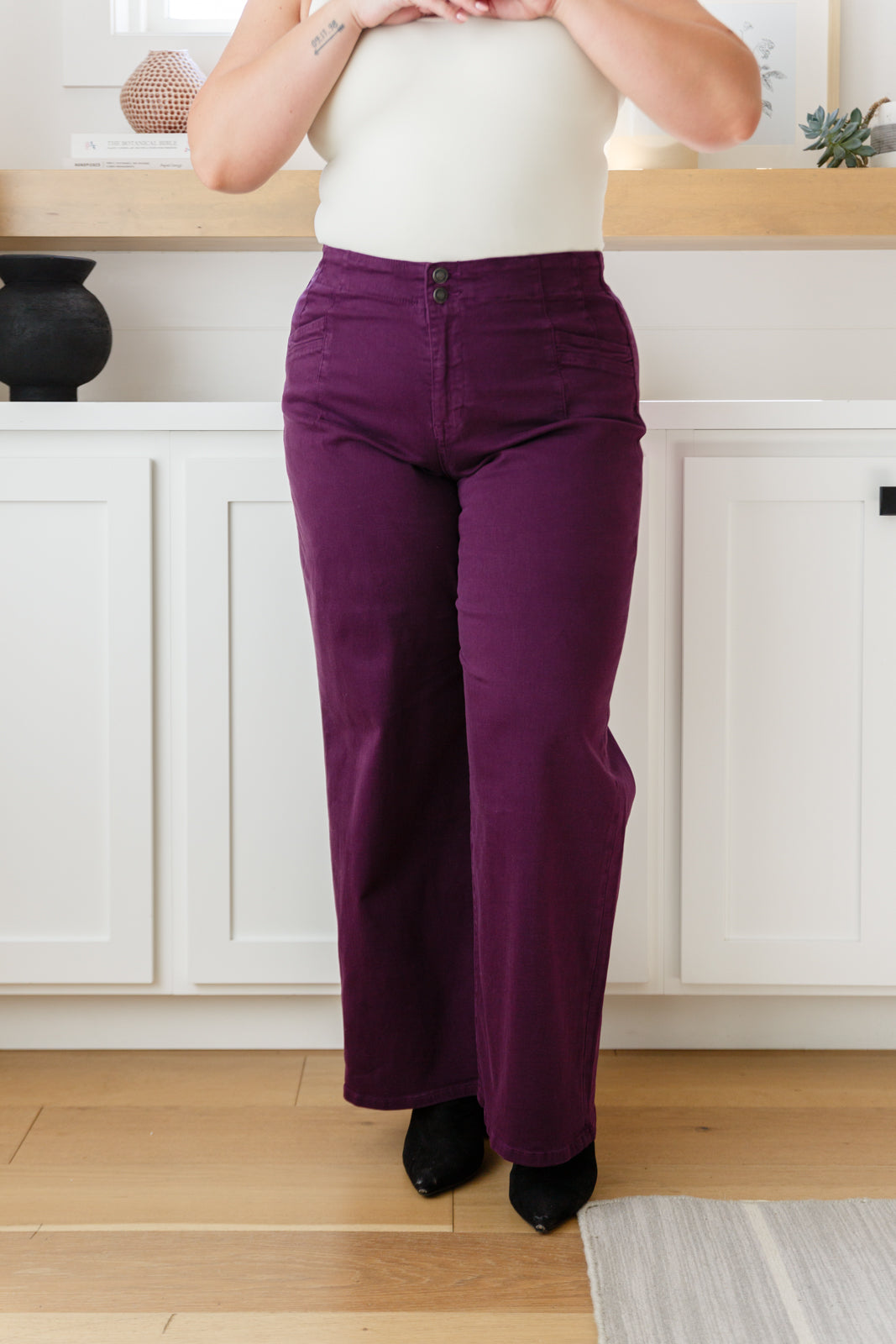 Plus size front view of Petunia Jeans in plum highlighting flattering high-rise fit and contour seaming.