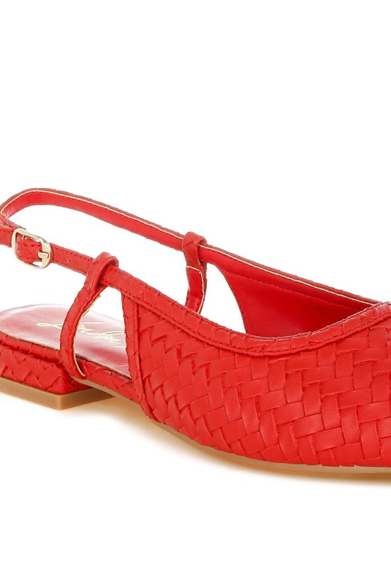 Close-up of red woven detail slingback sandals with pointed toe and low heel.