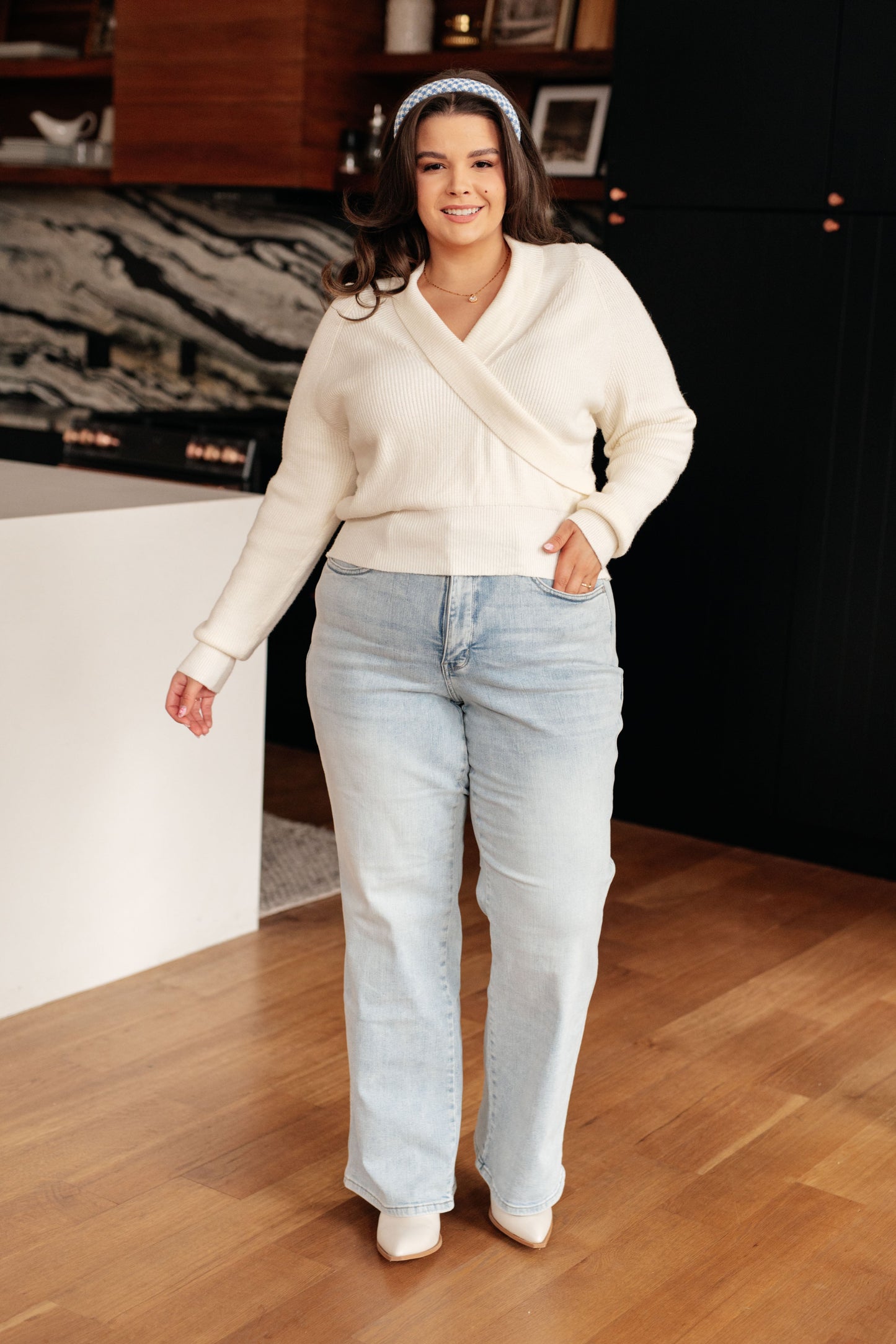 Front view of plus size Raquel Surplice Crop Sweater showing v-neck and collar.
