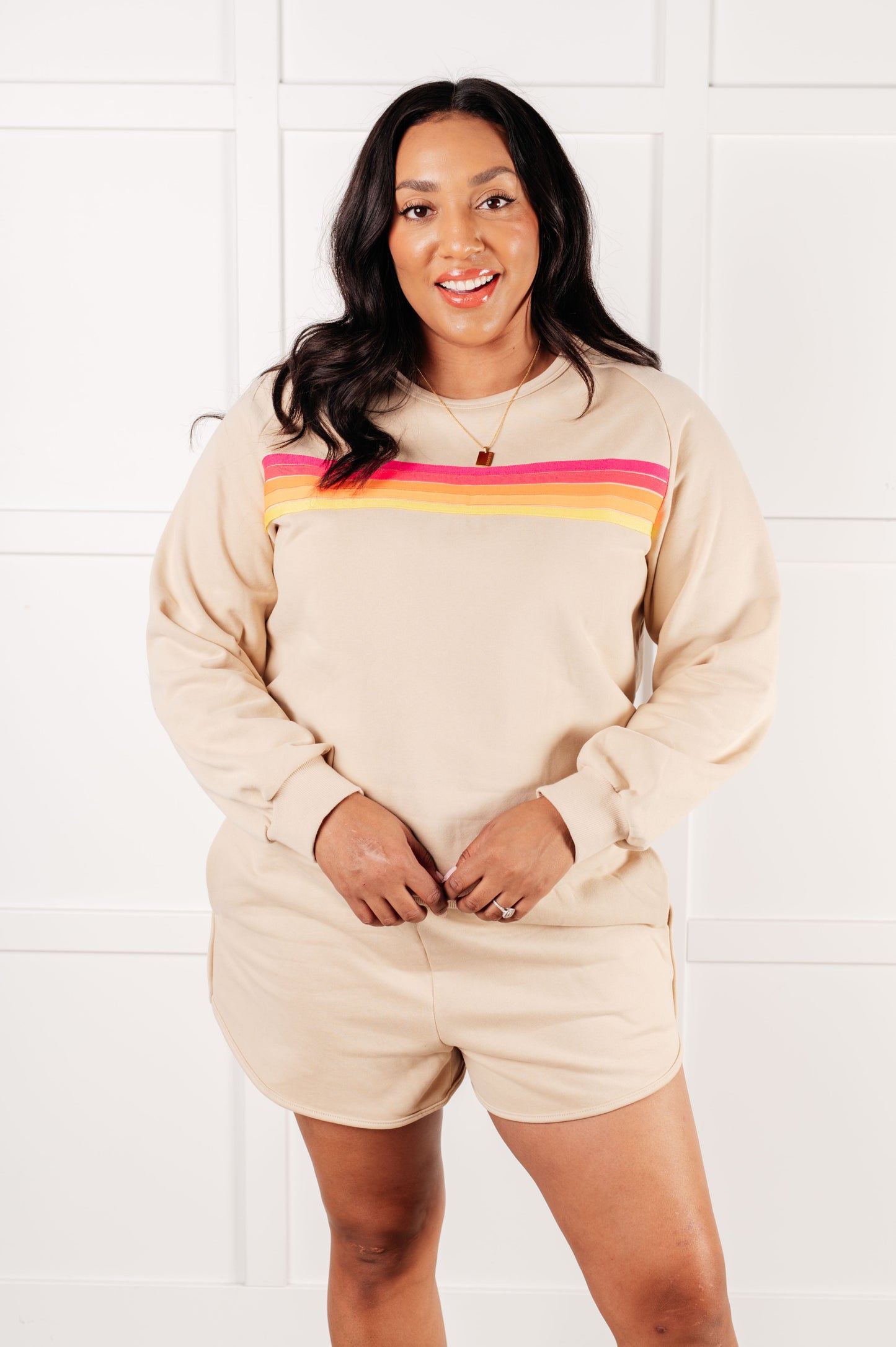 Plus size front view of Retro Rainbow Shorts Set showing striped rainbow top and elastic waistband shorts.