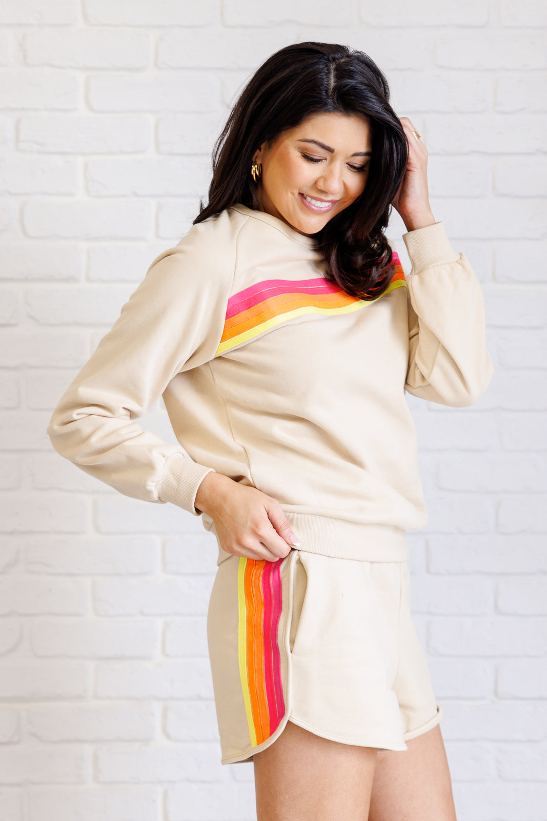 Side view of Retro Rainbow Shorts Set highlighting lounge fit, knit fabric, and side pockets.