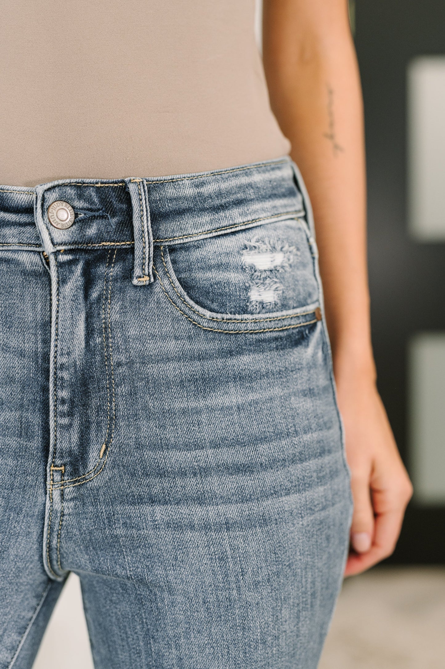 Robin High Waist Bootcut Jeans close up of zip fly closure and distress detail
