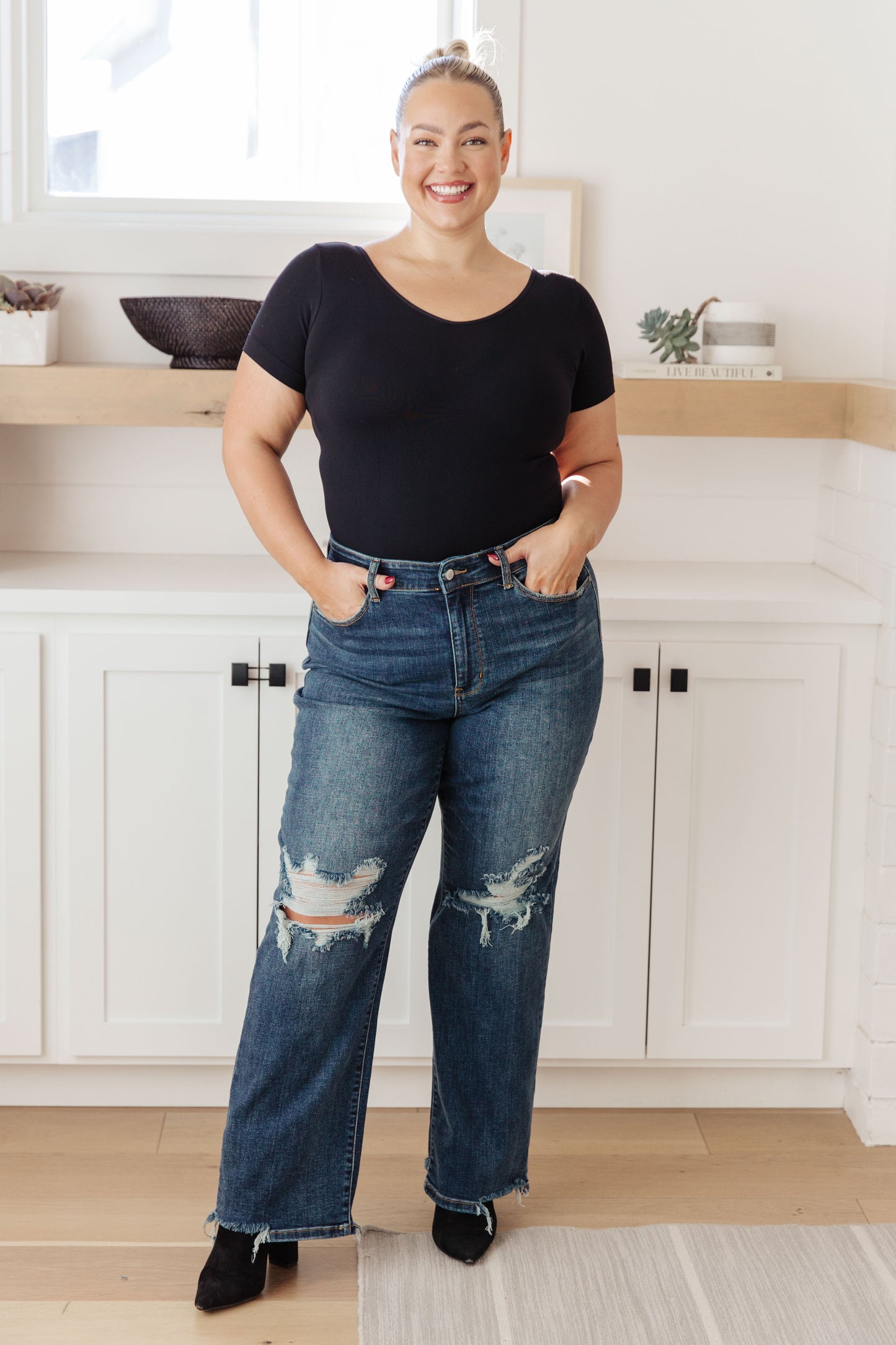 Plus size full body shot of Rose High Rise 90's Straight Jeans with vintage straight leg and distressed knees.