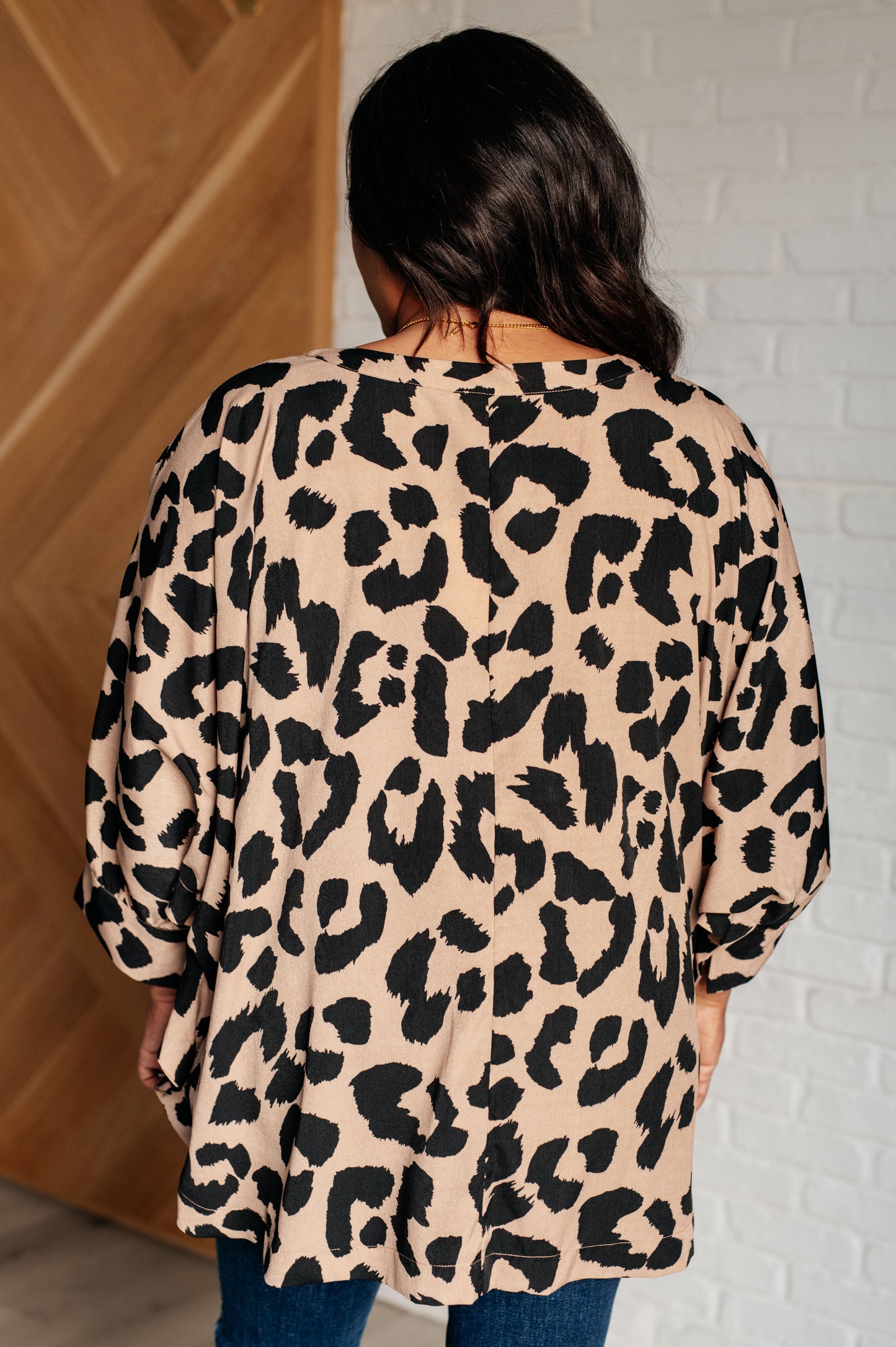 Back view of plus size Arlet Batwing Blouse with relaxed, stylish shape.