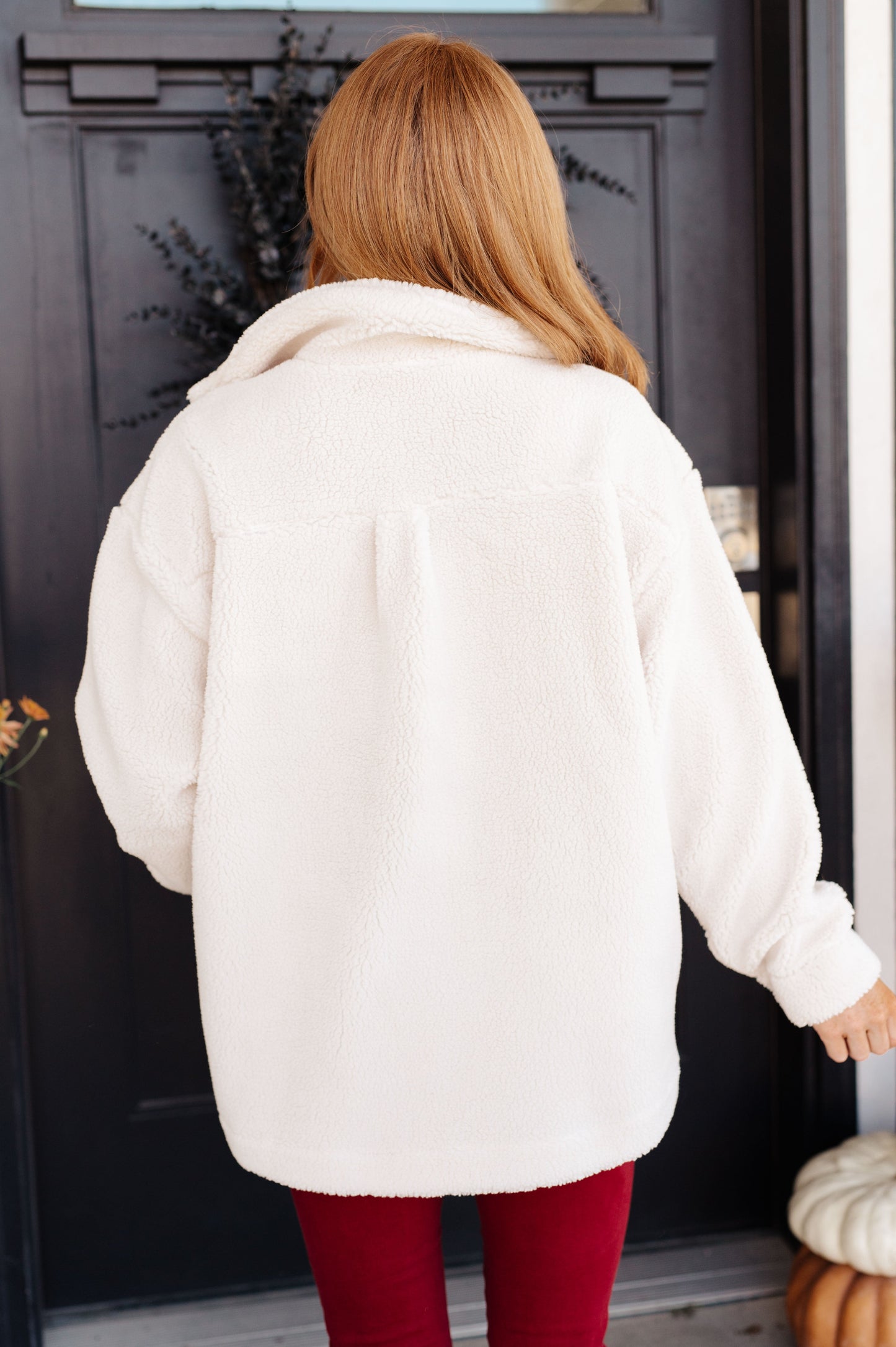 Back view of Shreya Sherpa Coat in White showing plush fleece and casual relaxed silhouette.