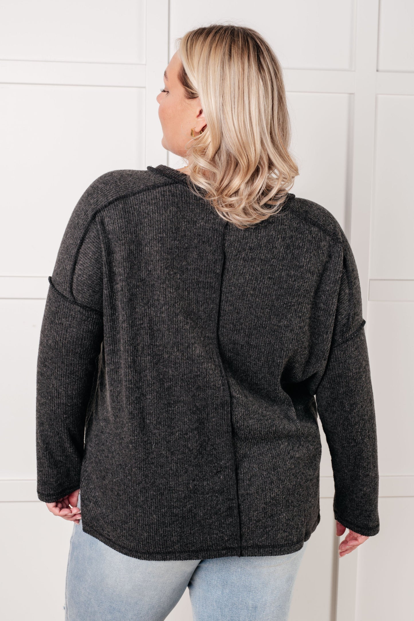 Plus size black Simon Ribbed Hacci Sweater back view with relaxed drop shoulders and brushed fabric.