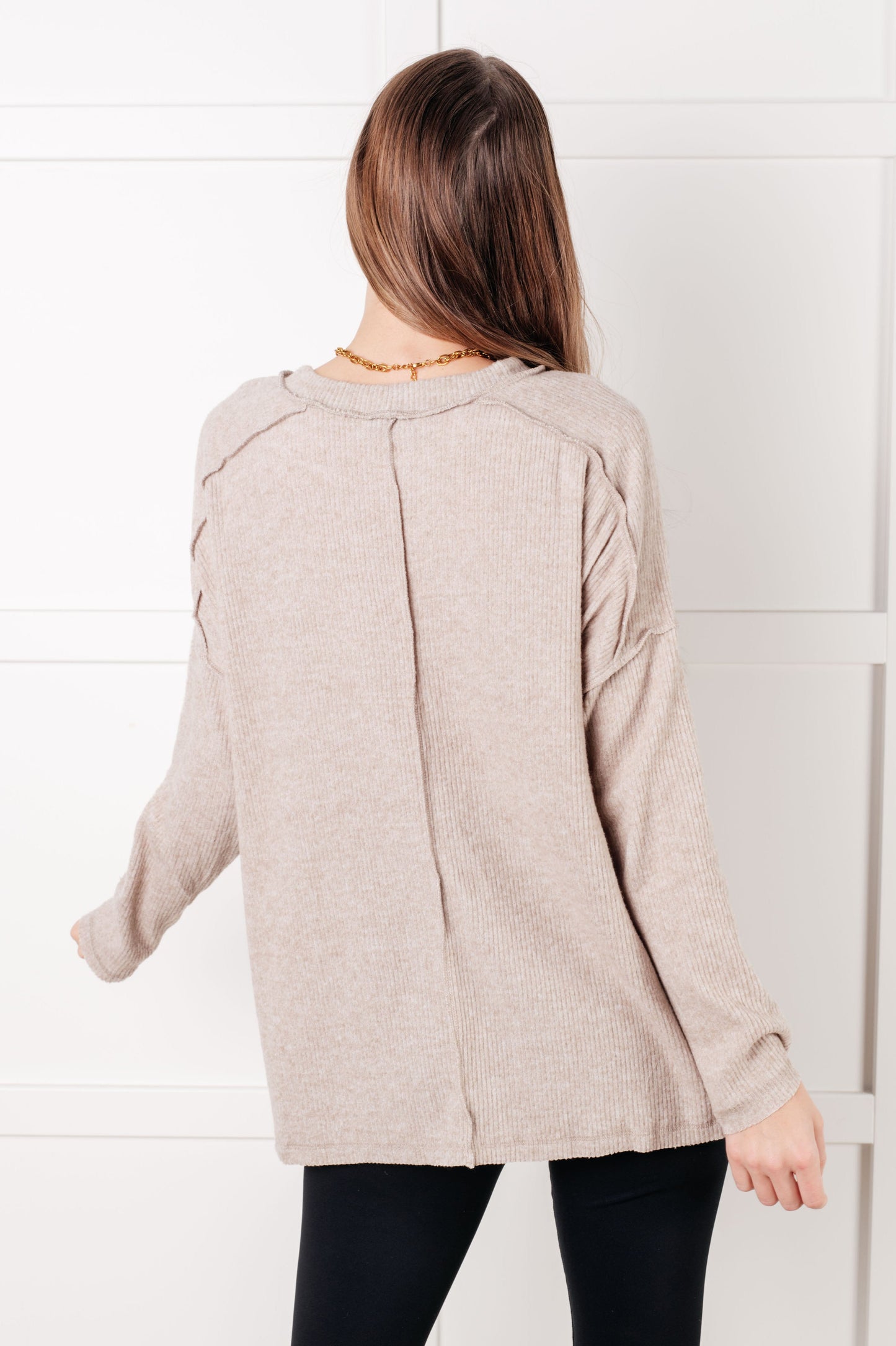 Back view of light mocha Simon Ribbed Hacci Sweater with drop shoulder sleeves and side slits.