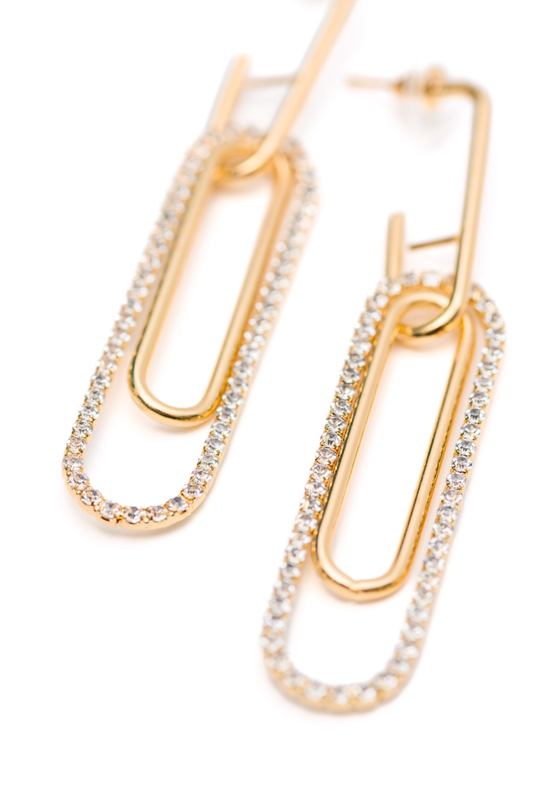 Top view of Sonia Link Earrings showing gold finish and rhinestone details