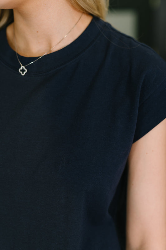 Detail shot of Sweeney Casual Dress in Navy banded neckline and sleeve cuffs.