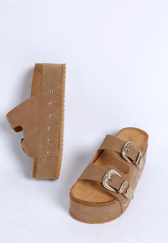 Taupe faux leather slip on sandals with chunky EVA sole styled for casual summer wear.