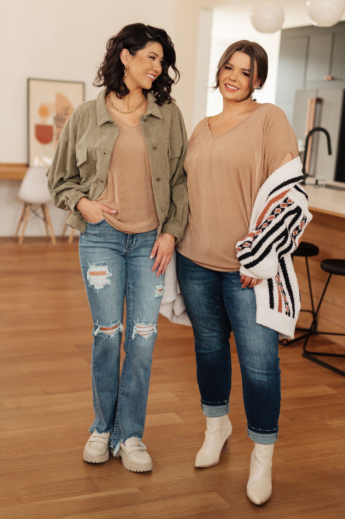 Standard and plus-size models wearing Alessandra V-Neck Top in taupe, styled with jeans.