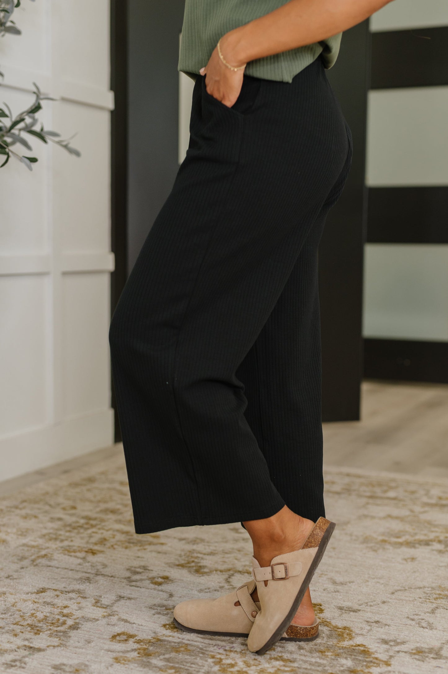 Thyme Culottes in Black side angle highlighting straight leg cut and elastic waistband