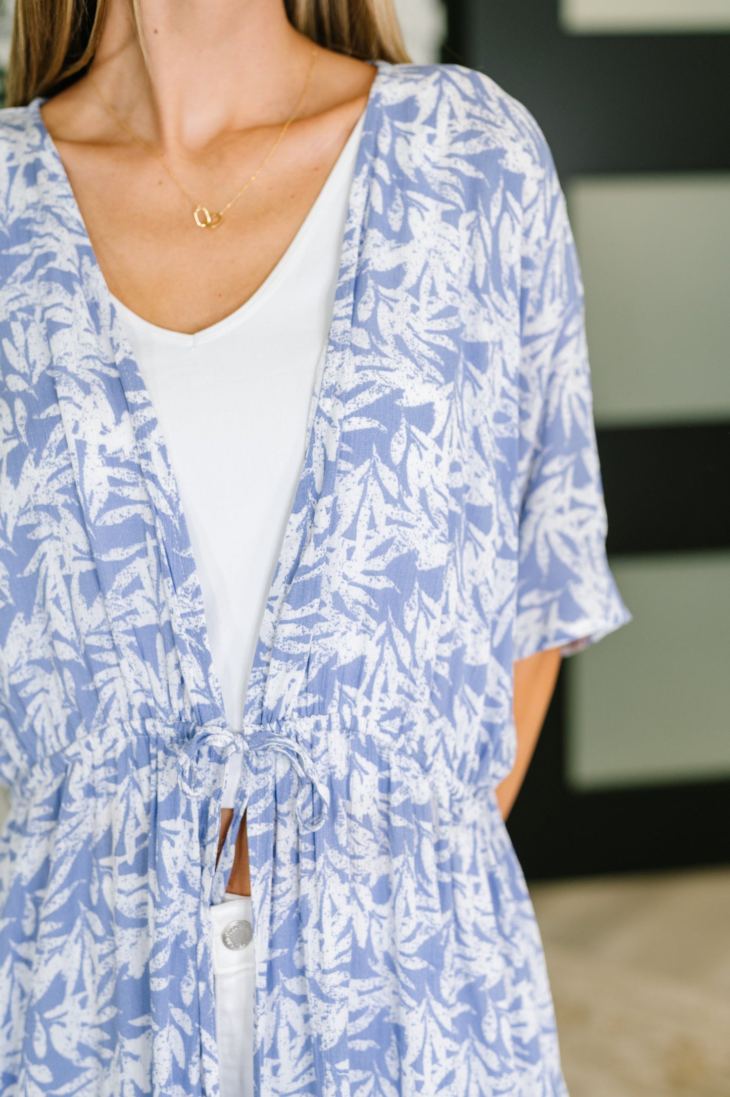 Close Up view of the Copacabana tropical kimono styled as beach cover-up with waist tie.