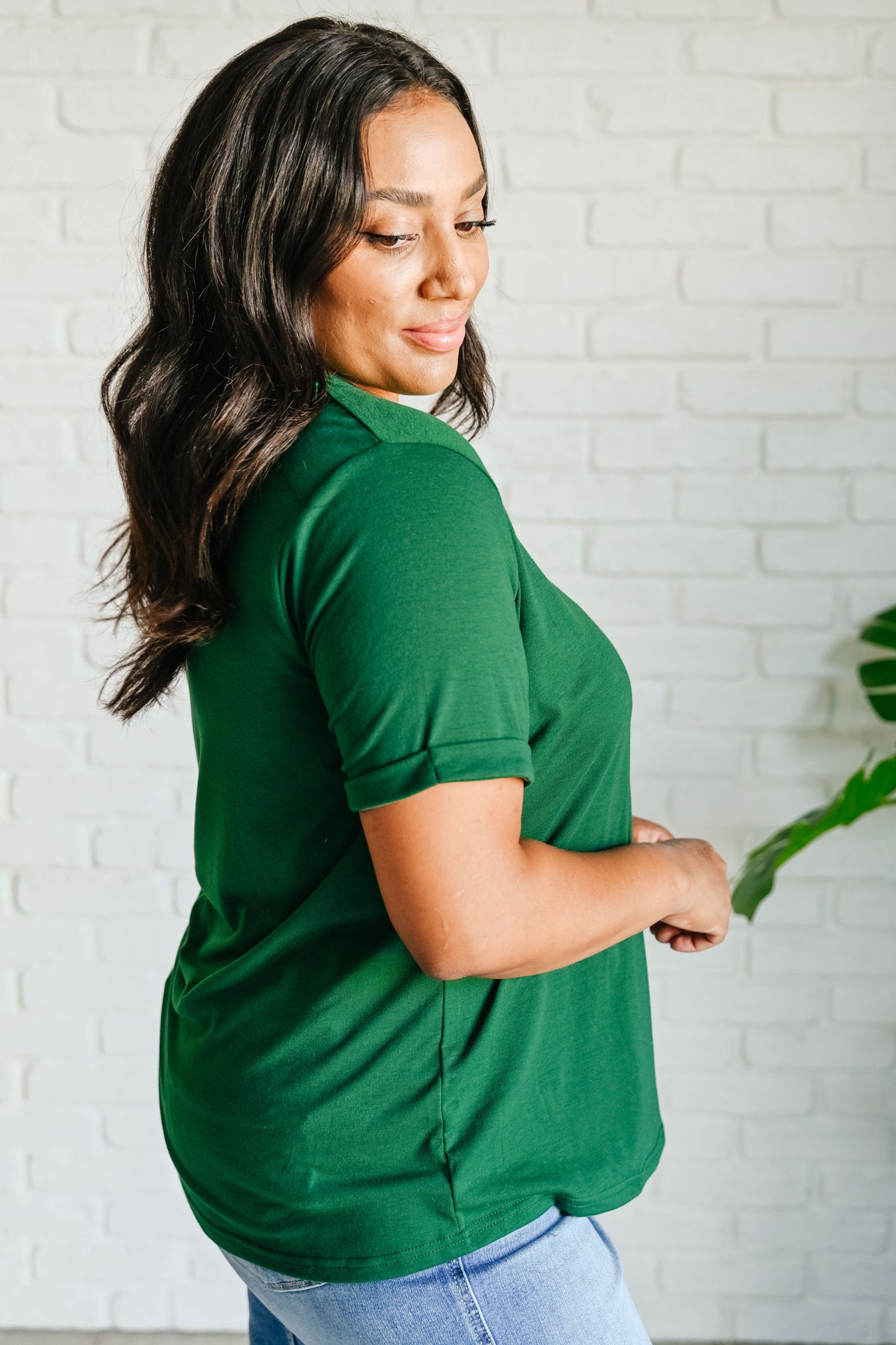 Side view of lightweight green plus size t-shirt – soft and breathable design.