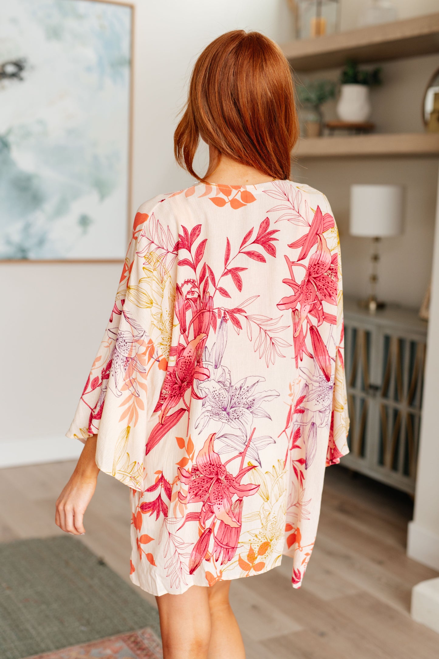 Back view of Mei Bell Sleeve Kimono, pink floral boho style with breezy open fit.