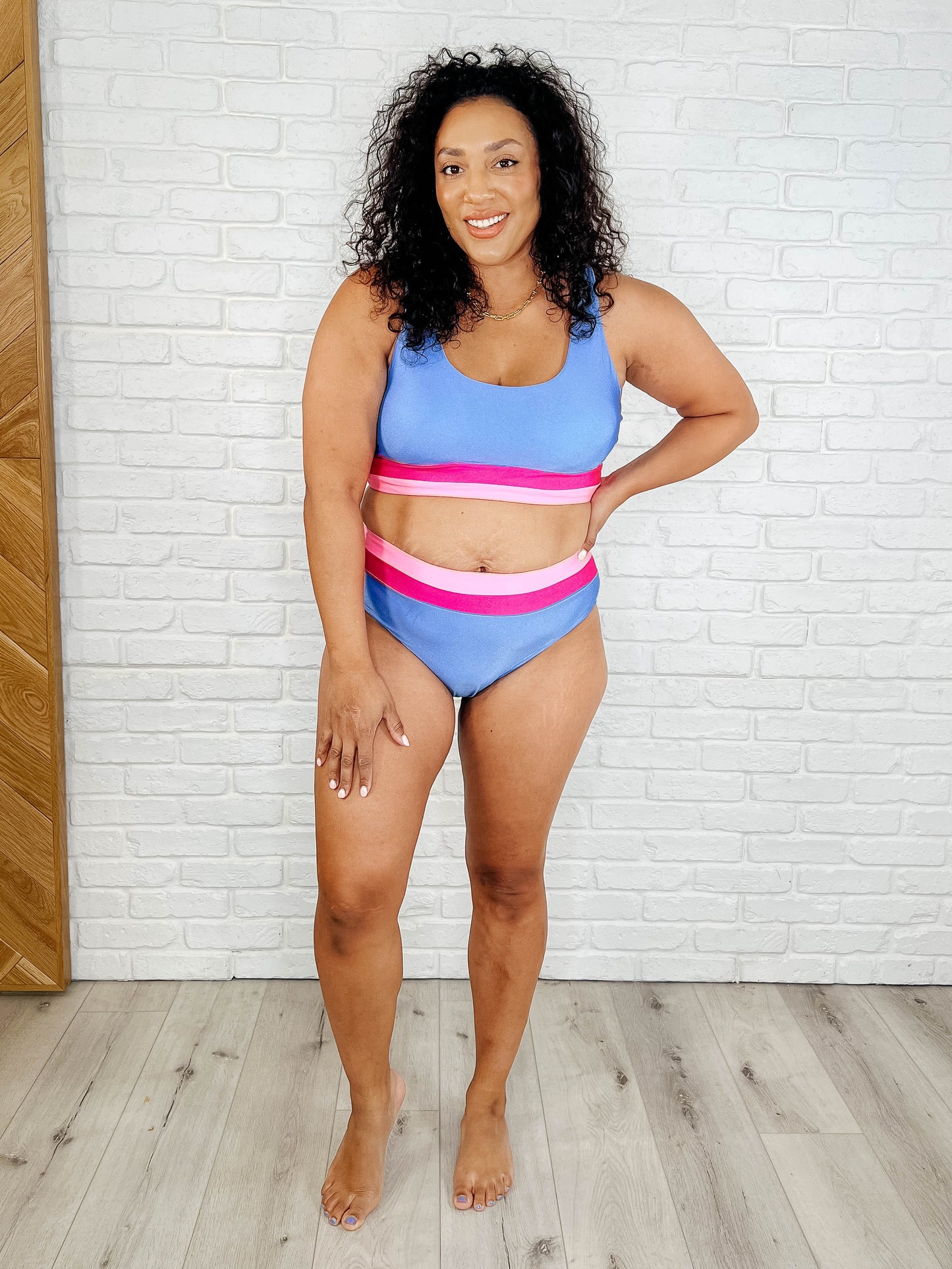 Plus size model in Venice Swim Bottoms and matching top, high-waist color block design.