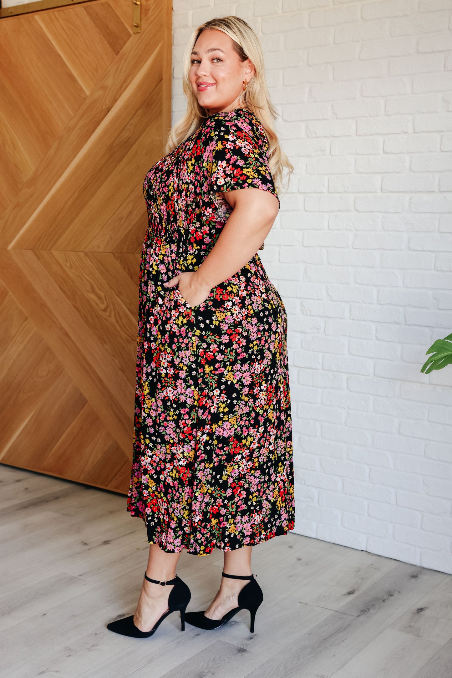 Anne Floral Dress with smocked waist, v-neckline, and flutter sleeves for a feminine, flattering fit.