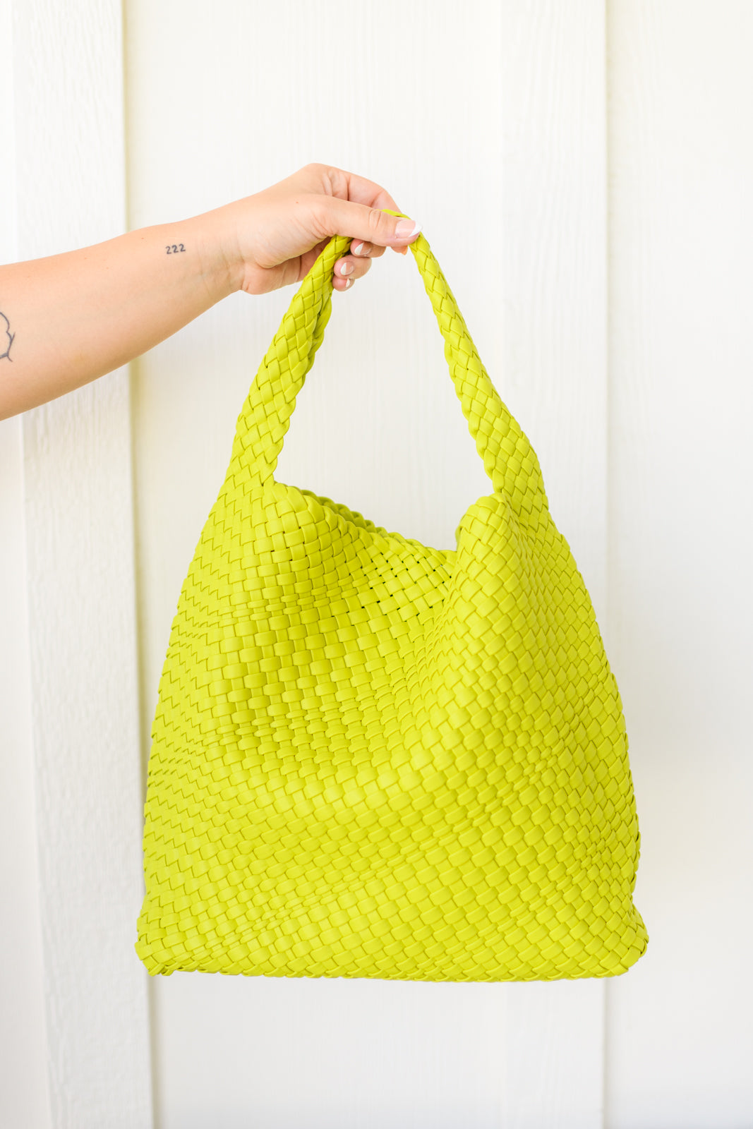 Women's tote bag purse in vibrant citron color with a basket weave pattern, made of PU vegan leather. Includes a matching zippered clutch and features a magnetic closure.
