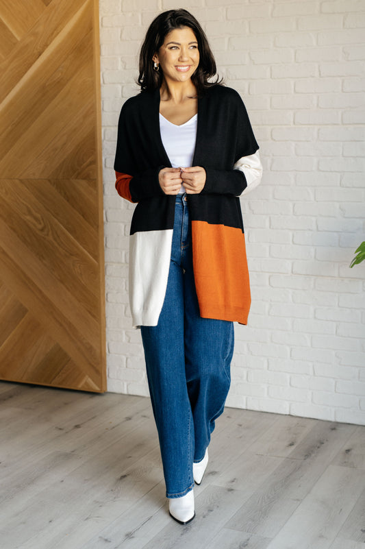 Model in Jackie color block cardigan full body front view