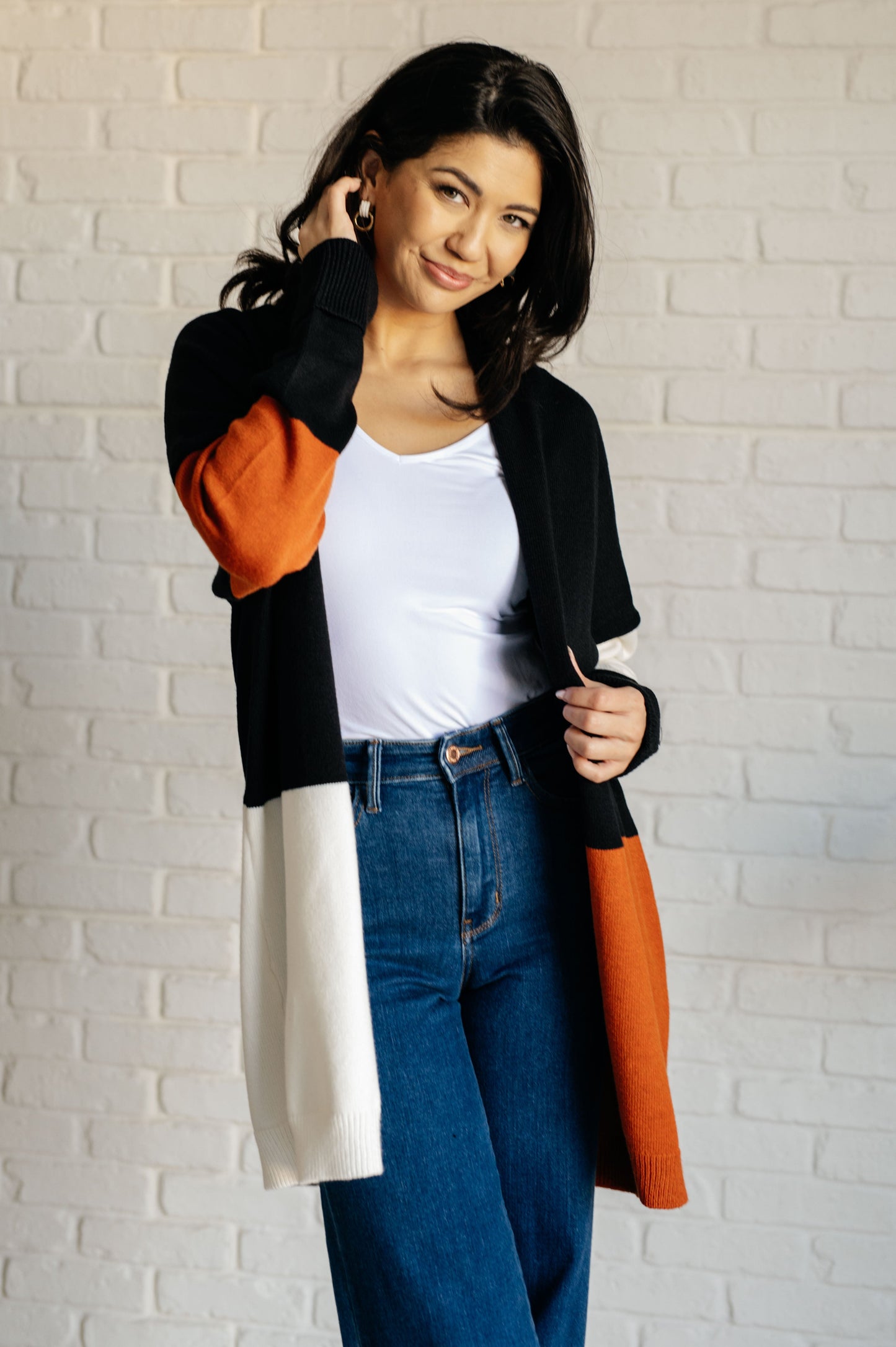 Model wearing Jackie color block cardigan front view
