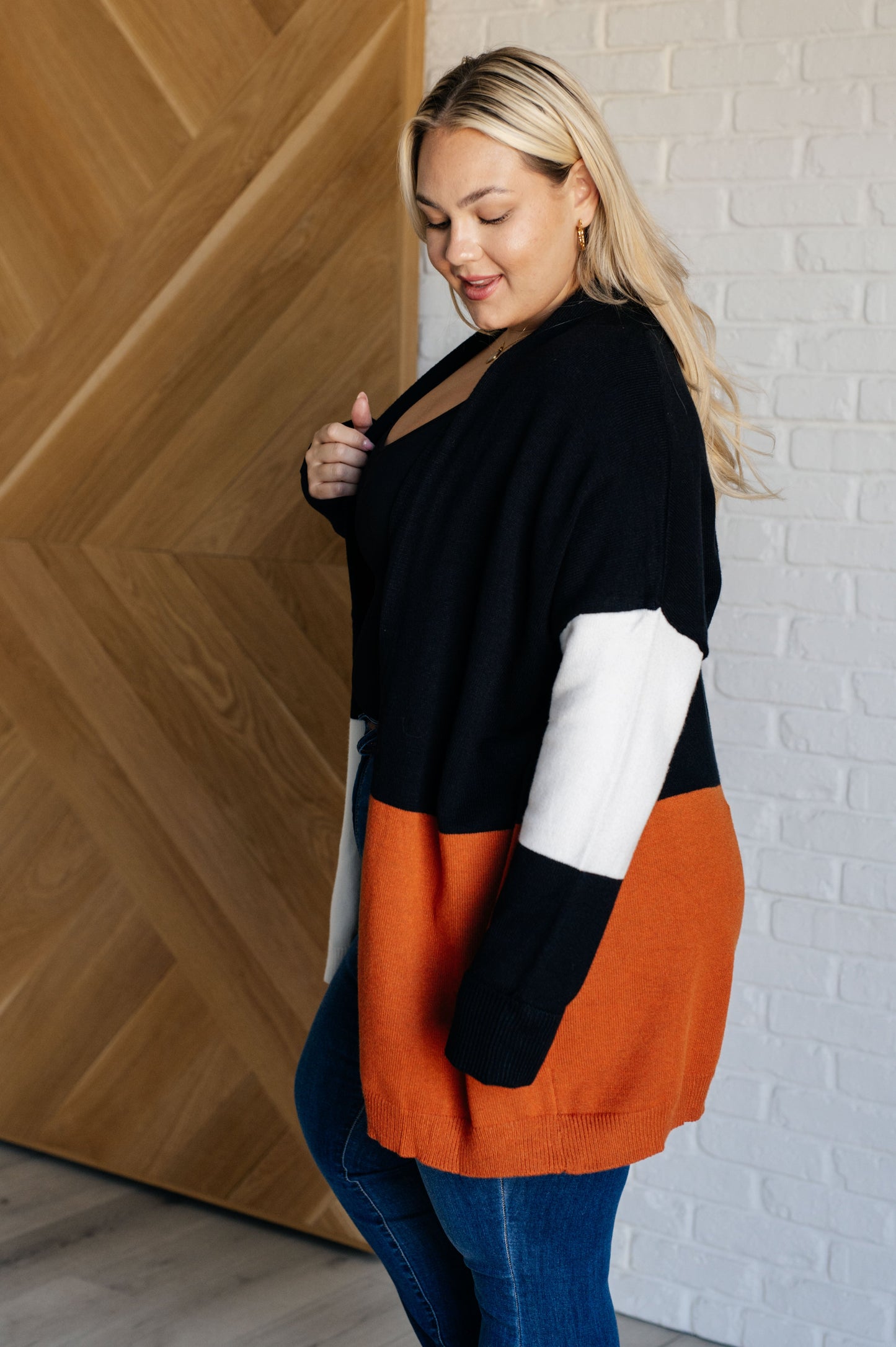 Plus size model side angle Jackie color block cardigan