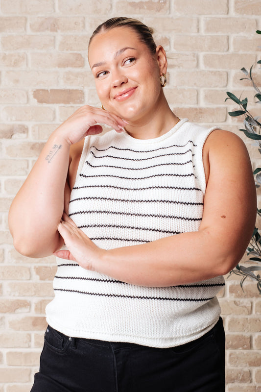 Plus size model in Yarely Striped Knit Tank with halter neckline, ribbed details, and striped sweater knit fabric.