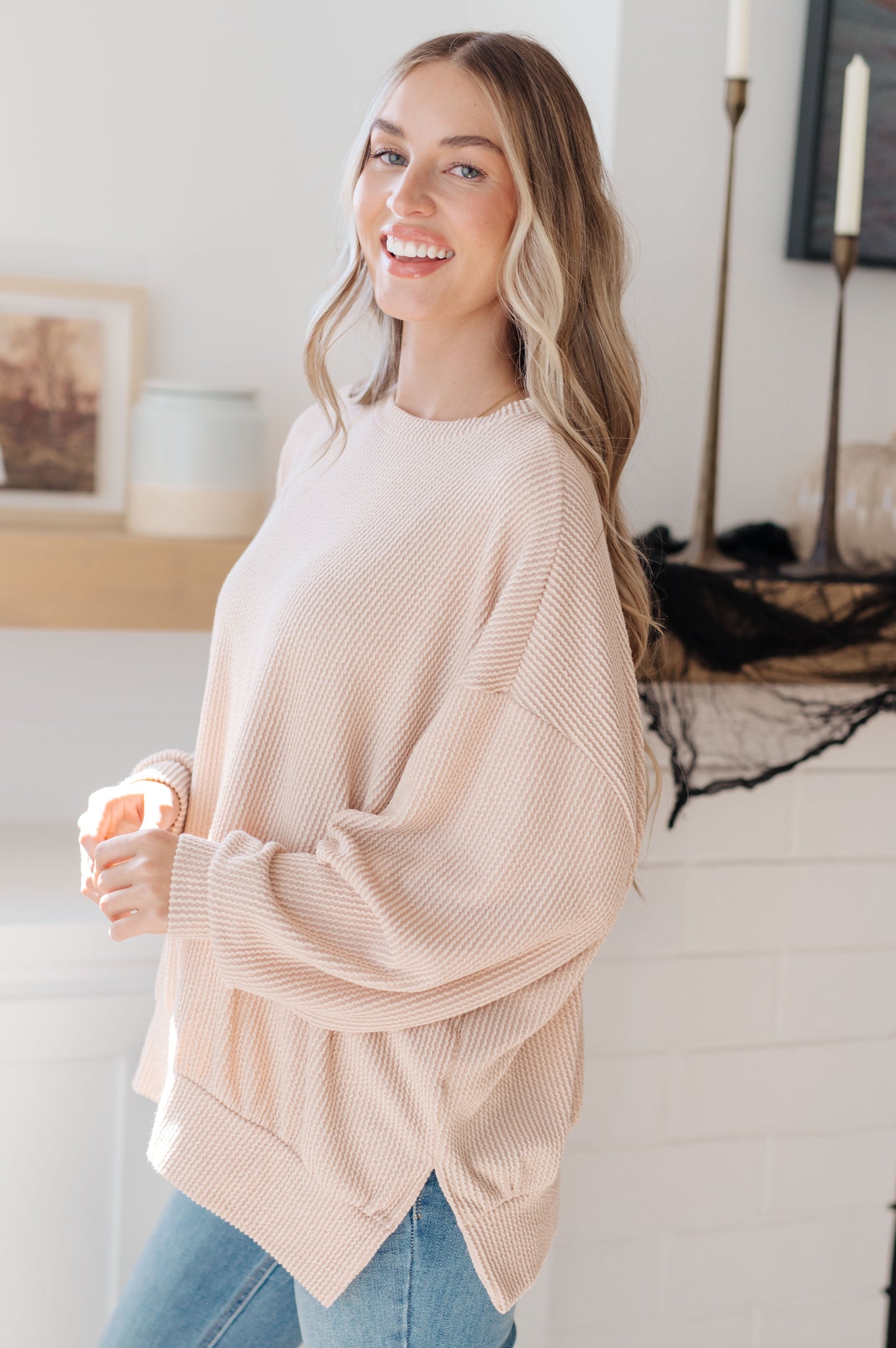 Woman in Holly Pullover showing dropped shoulder detail.