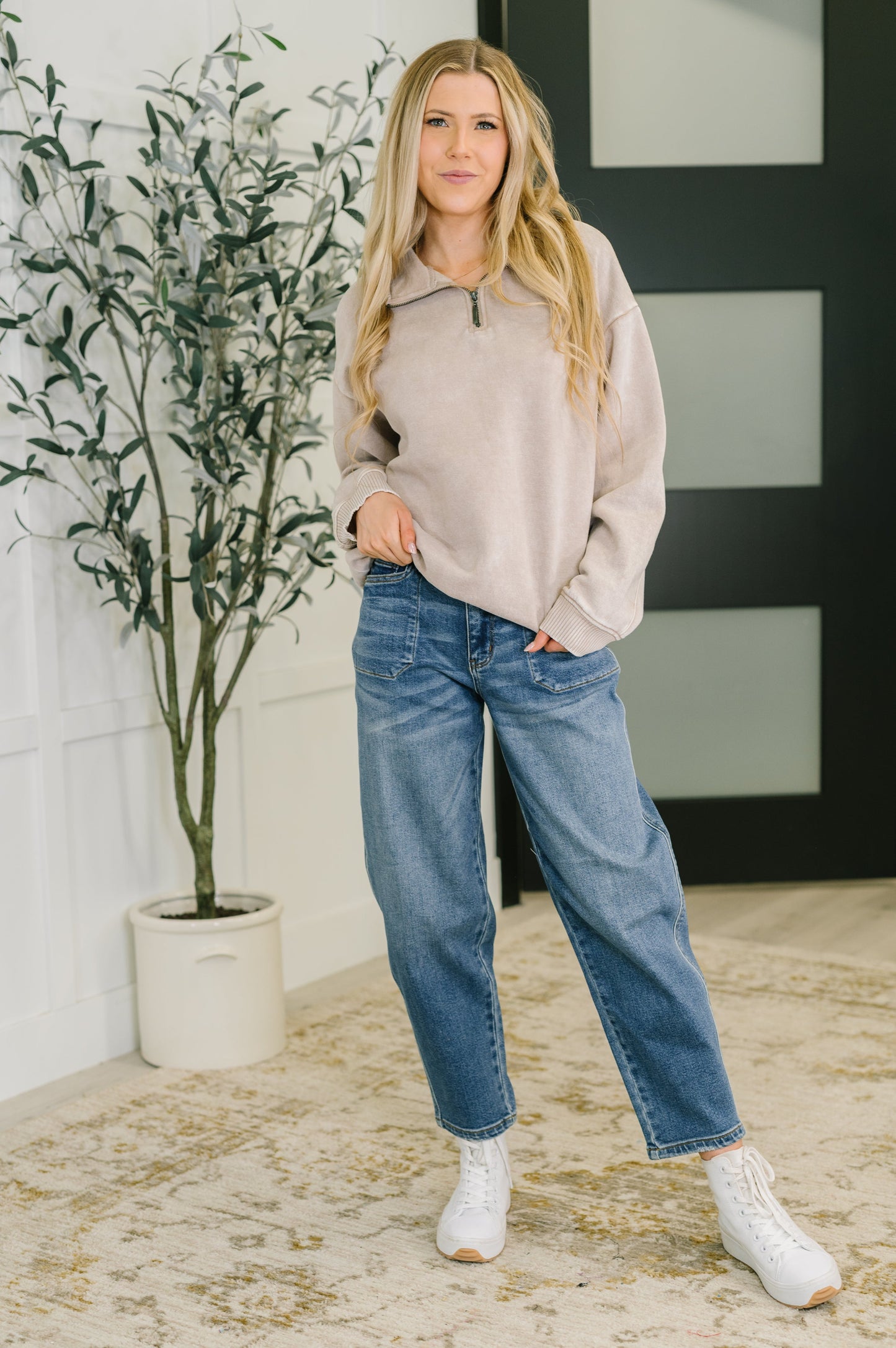 Full body view of model wearing Sutton Half Zip Pullover in Ash Mocha
