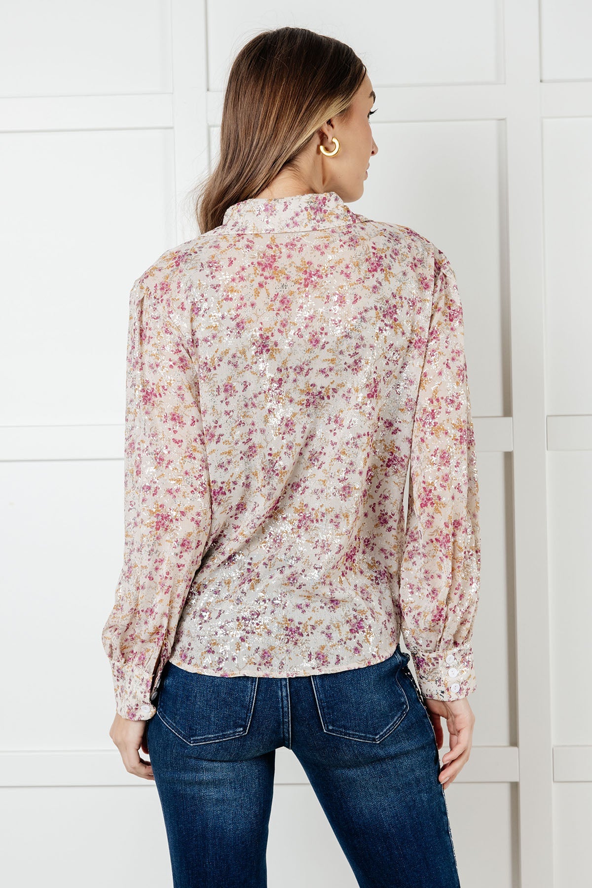 Back view of Teigan Floral Button Up Blouse showing burgundy floral print on beige chiffon fabric.