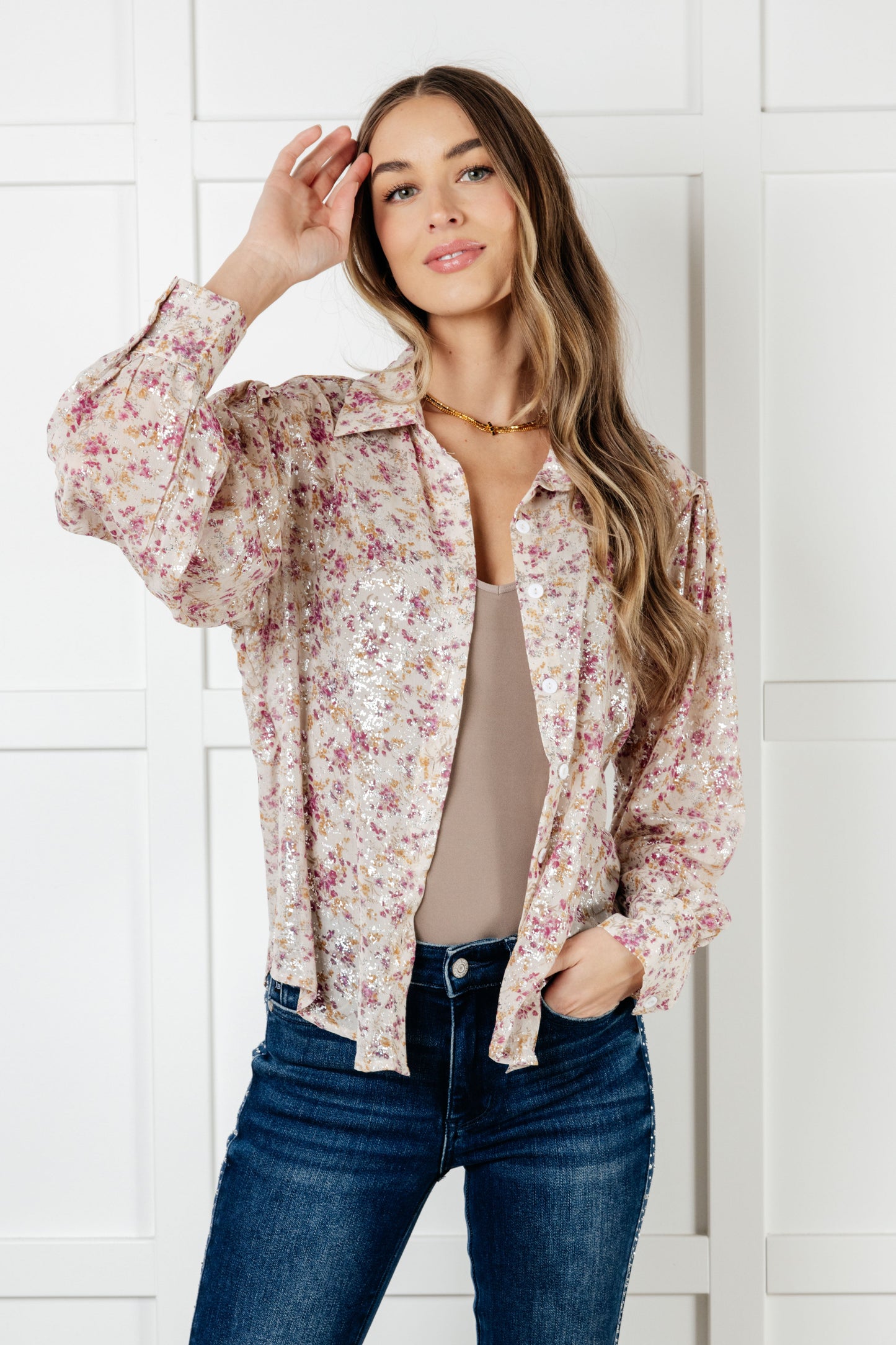 Front view of Teigan Floral Button Up Blouse in beige chiffon with burgundy floral pattern and scooped hemline.